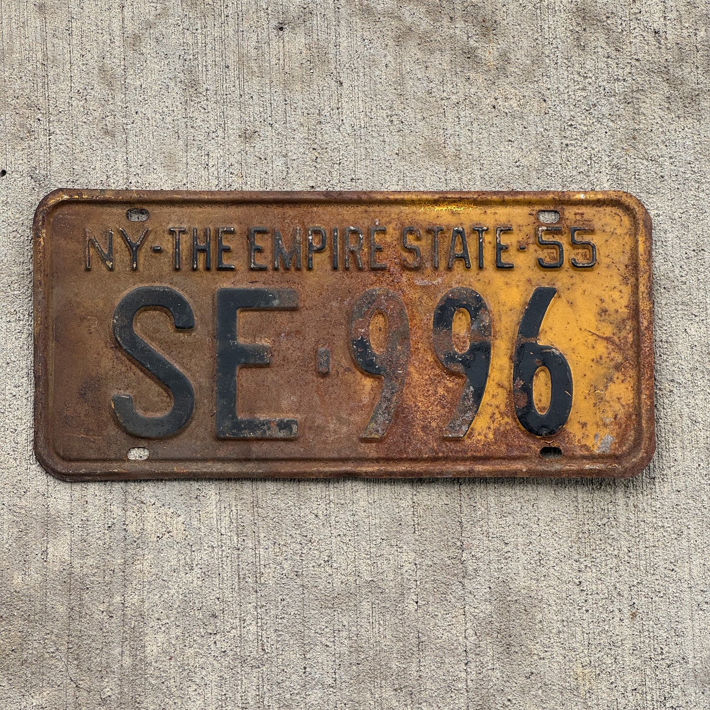 Photo of a 1955 New York License Plate Auto Tag Garage Decor Vintage SE 996 with original patina