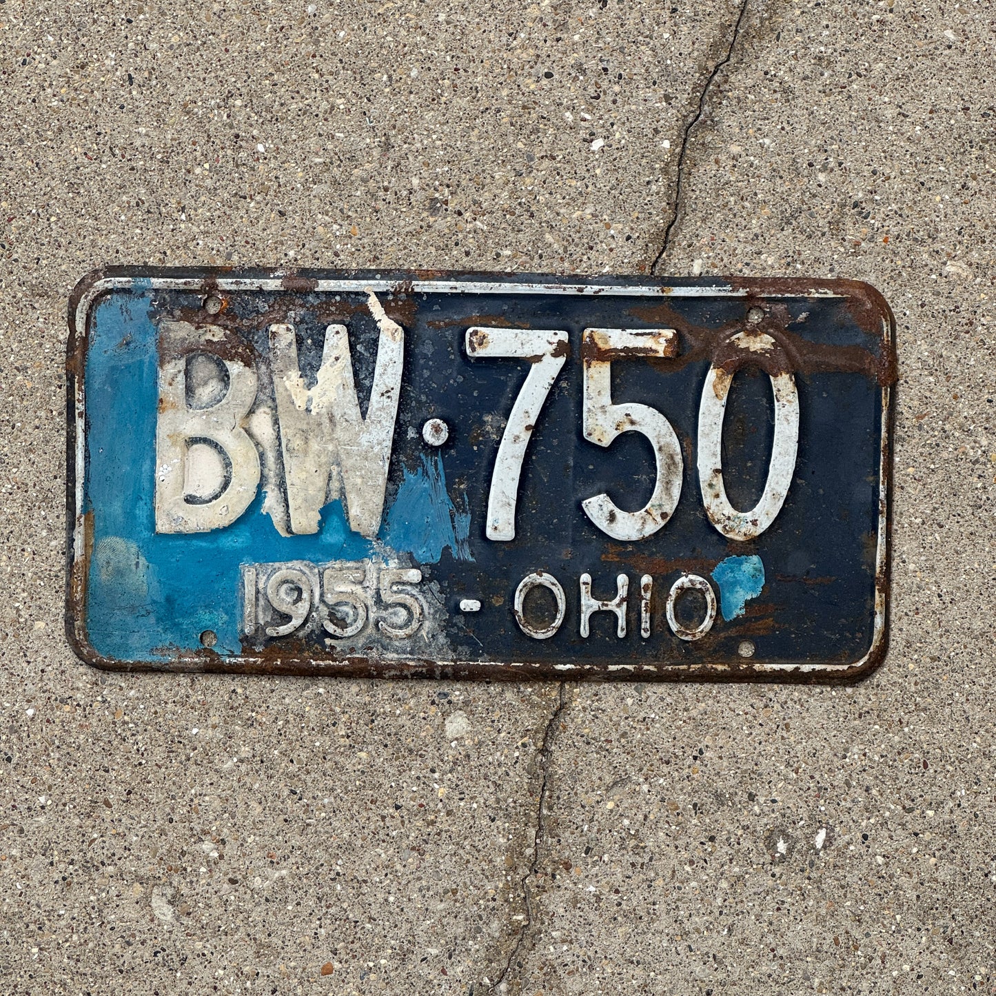 Photo of a 1955 Ohio License Plate Auto Tag 2 Vintage Garage BW 750 with original patina