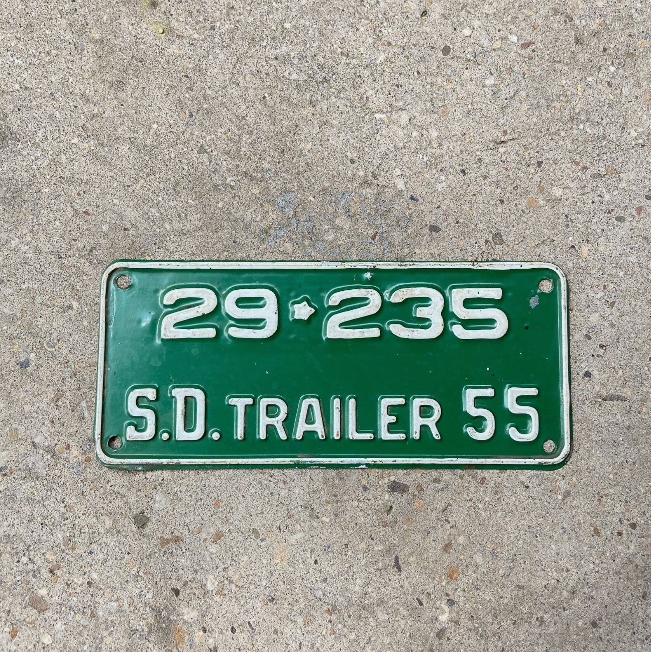 Photo of a 1955 South Dakota Trailer License Plate Auto Tag Garage Decor Vintage 29 235 with original patina