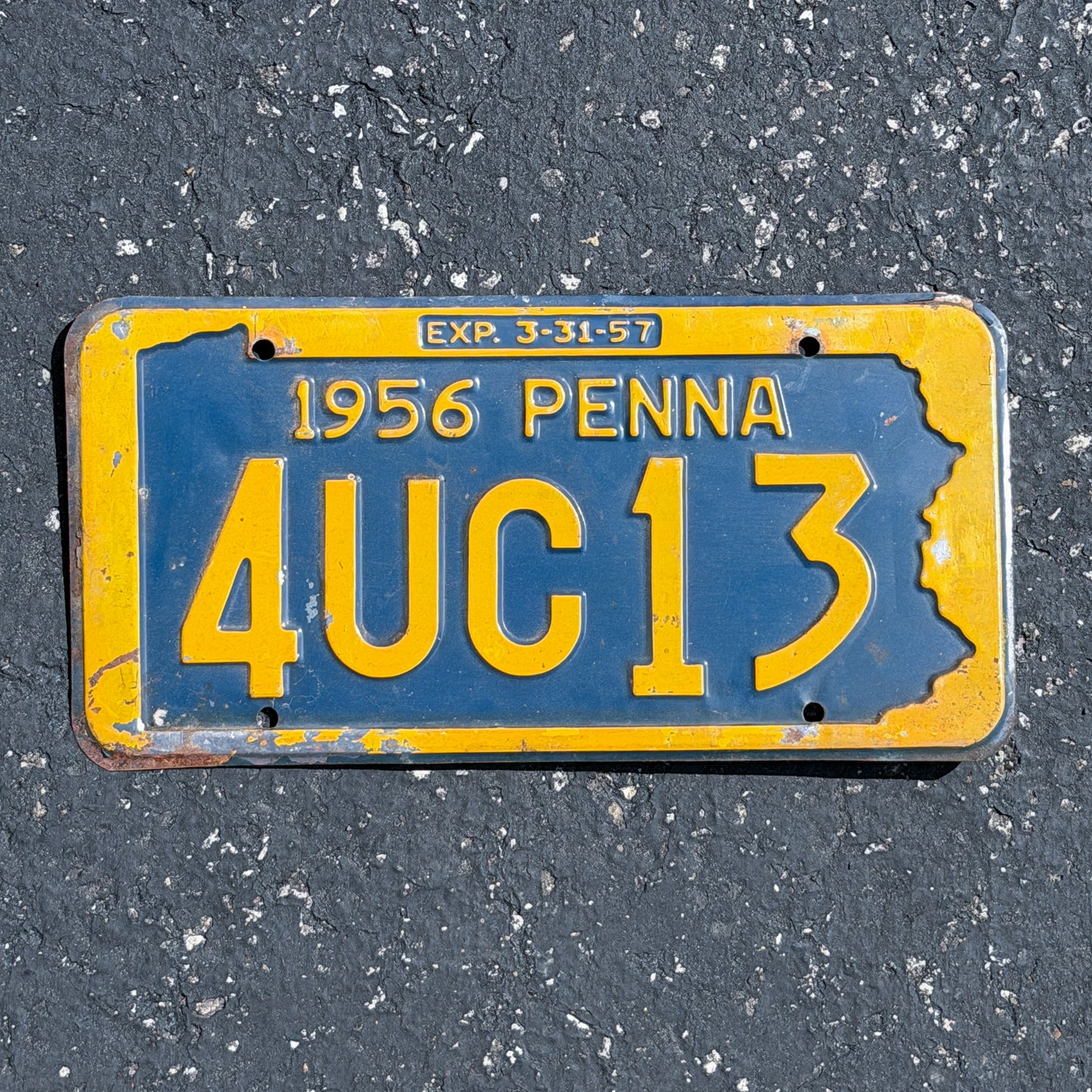 Photo of a 1956 1957 Pennsylvania License Plate Auto Tag Garage Decor Vintage 4 UC 13 with original patina