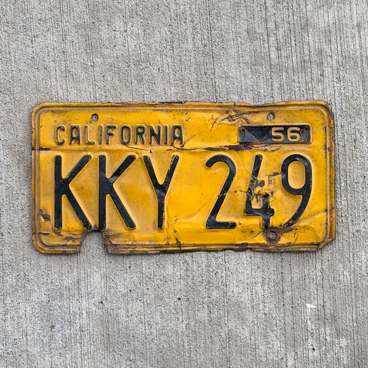 Photo of a 1956 California License Plate Auto Tag Garage Decor Vintage KKY 249 with original patina