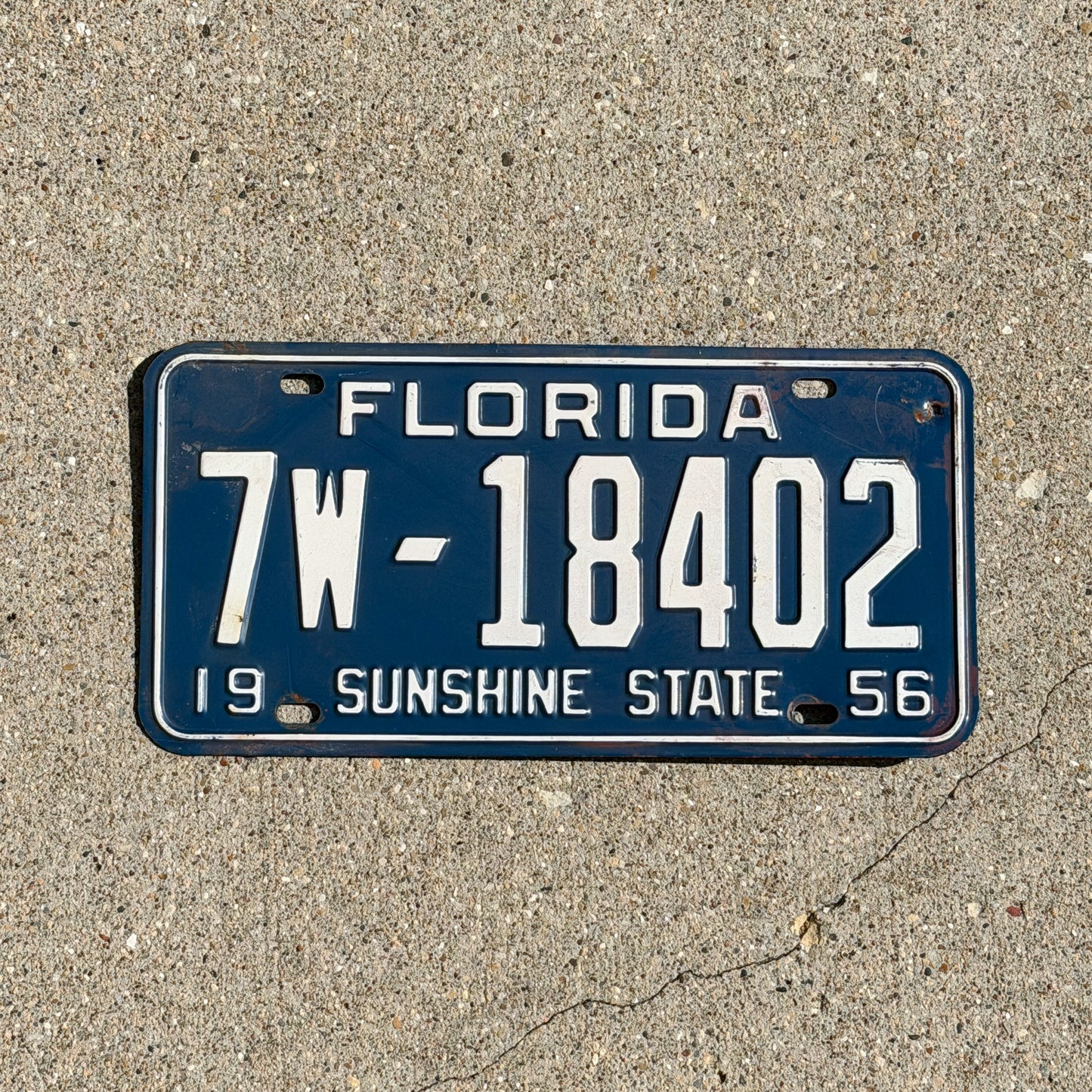 Photo of a 1956 Florida License Plate Auto Tag Garage Decor Vintage 7W 18402 with original patina