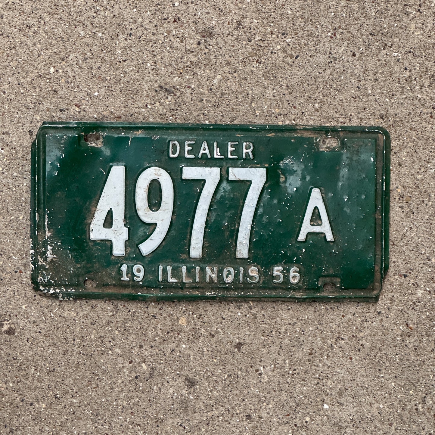 Photo of a 1956 Illinois Dealer License Plate Auto Tag Garage Decor Vintage 4977 A with original patina