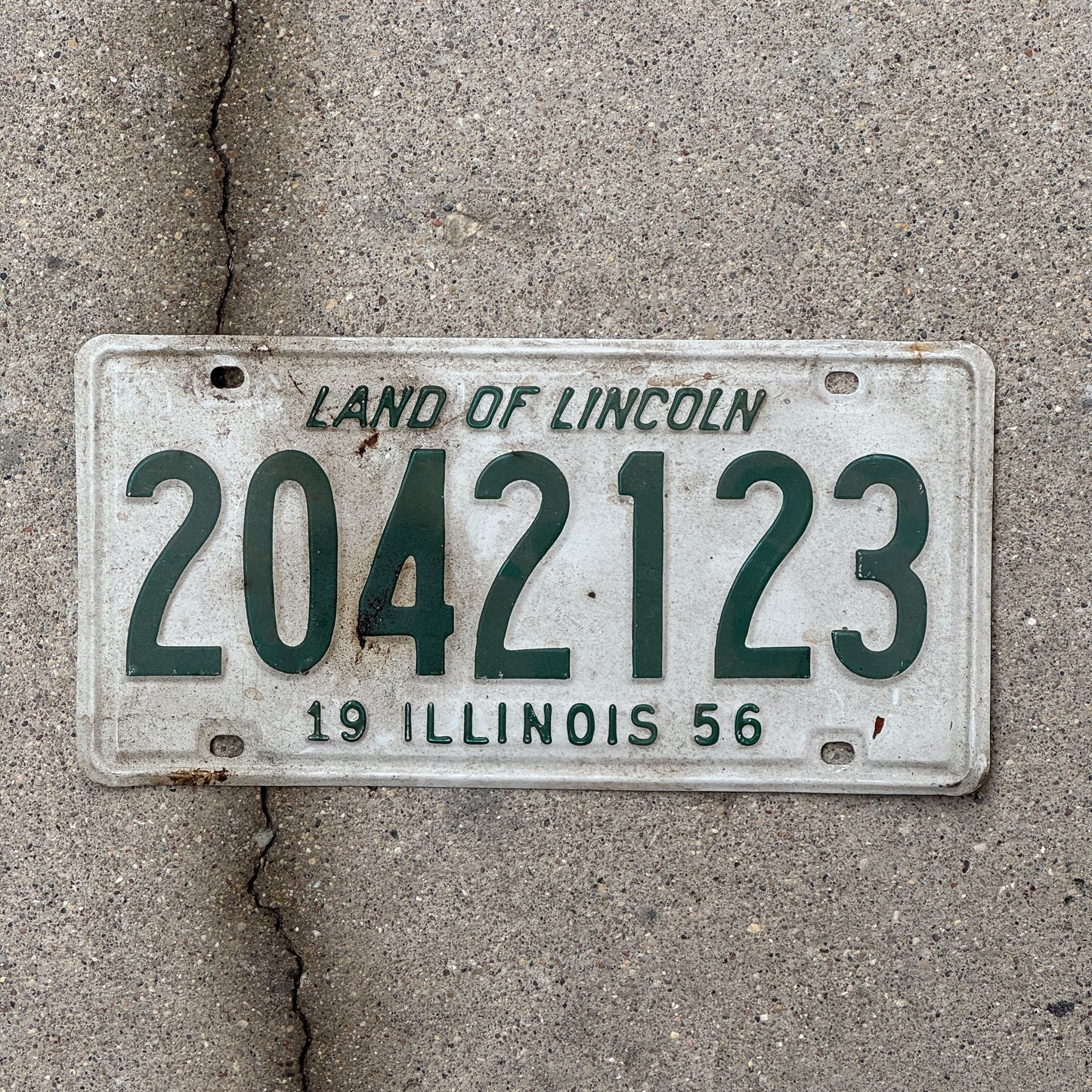 Photo of a 1956 Illinois License Plate Auto Tag Garage Decor Vintage 2 042 123 with original patina