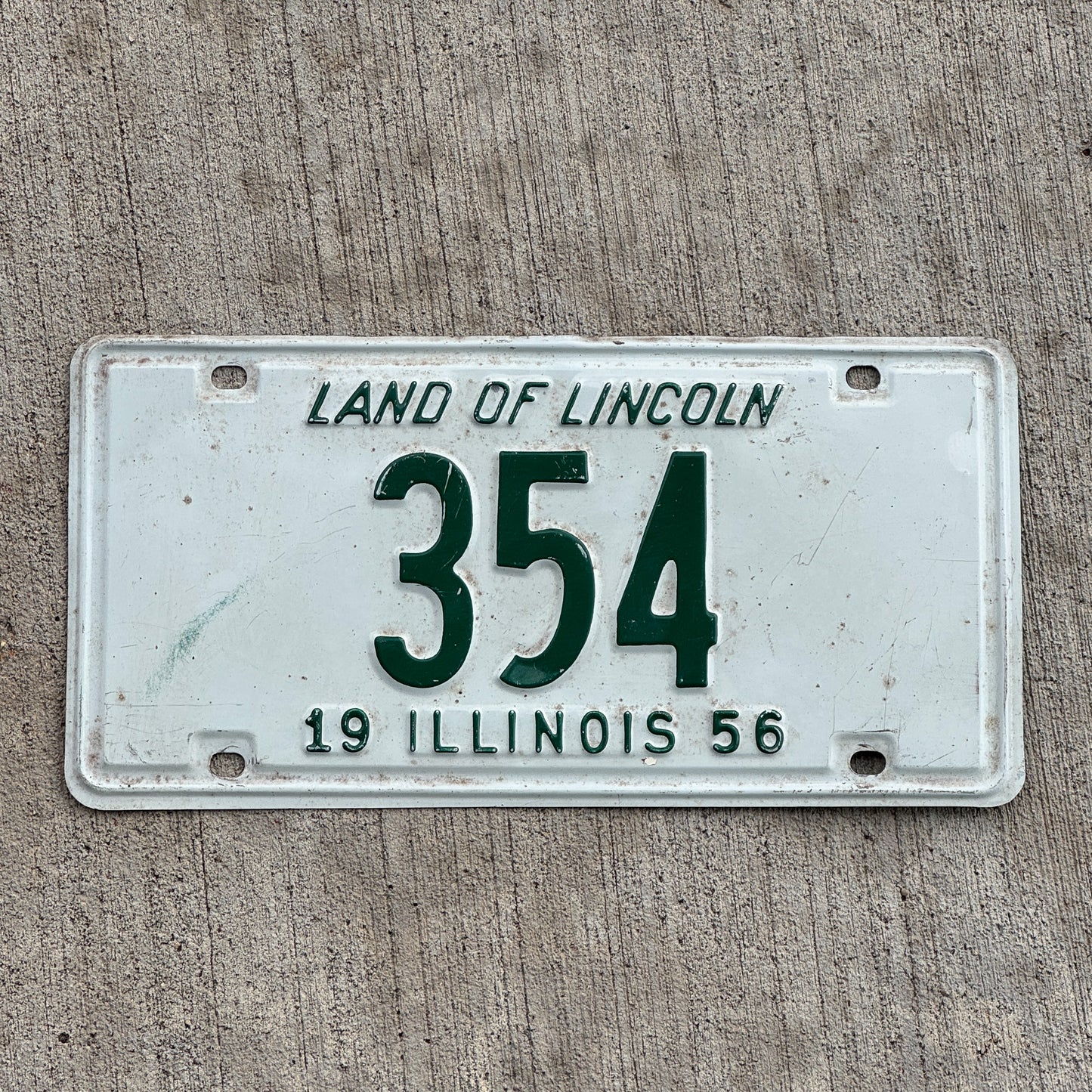 Photo of a 1956 Illinois License Plate Auto Tag Garage Decor Vintage Low Number Three Digit 354 with original patina