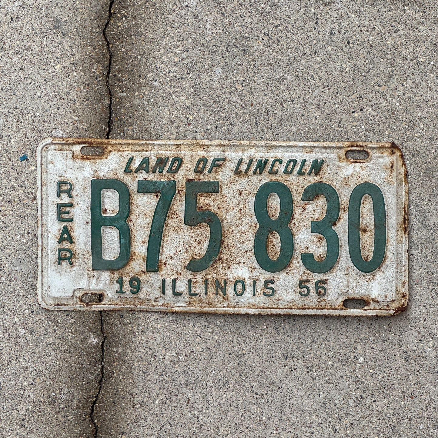 Photo of a 1956 Illinois Truck License Plate Auto Tag 1 Vintage Garage Rear Plate B 75 830 with original patina