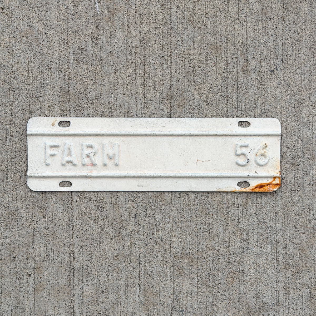 Photo of a 1956 Kansas Farm Truck License Plate Auto Tag Garage Decor Vintage Supplementary Topper with original patina