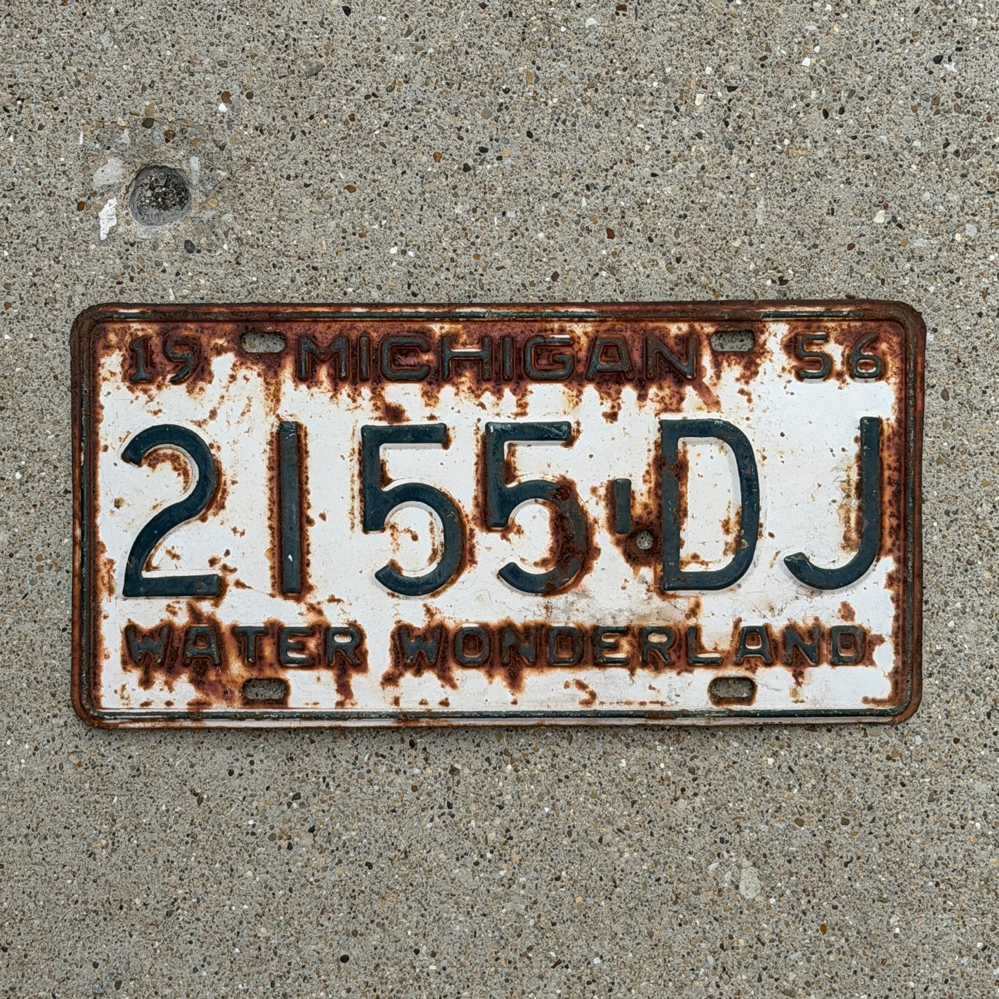 Photo of a 1956 Michigan Commercial License Plate Auto Tag Garage Decor Vintage 2155 DJ with original patina