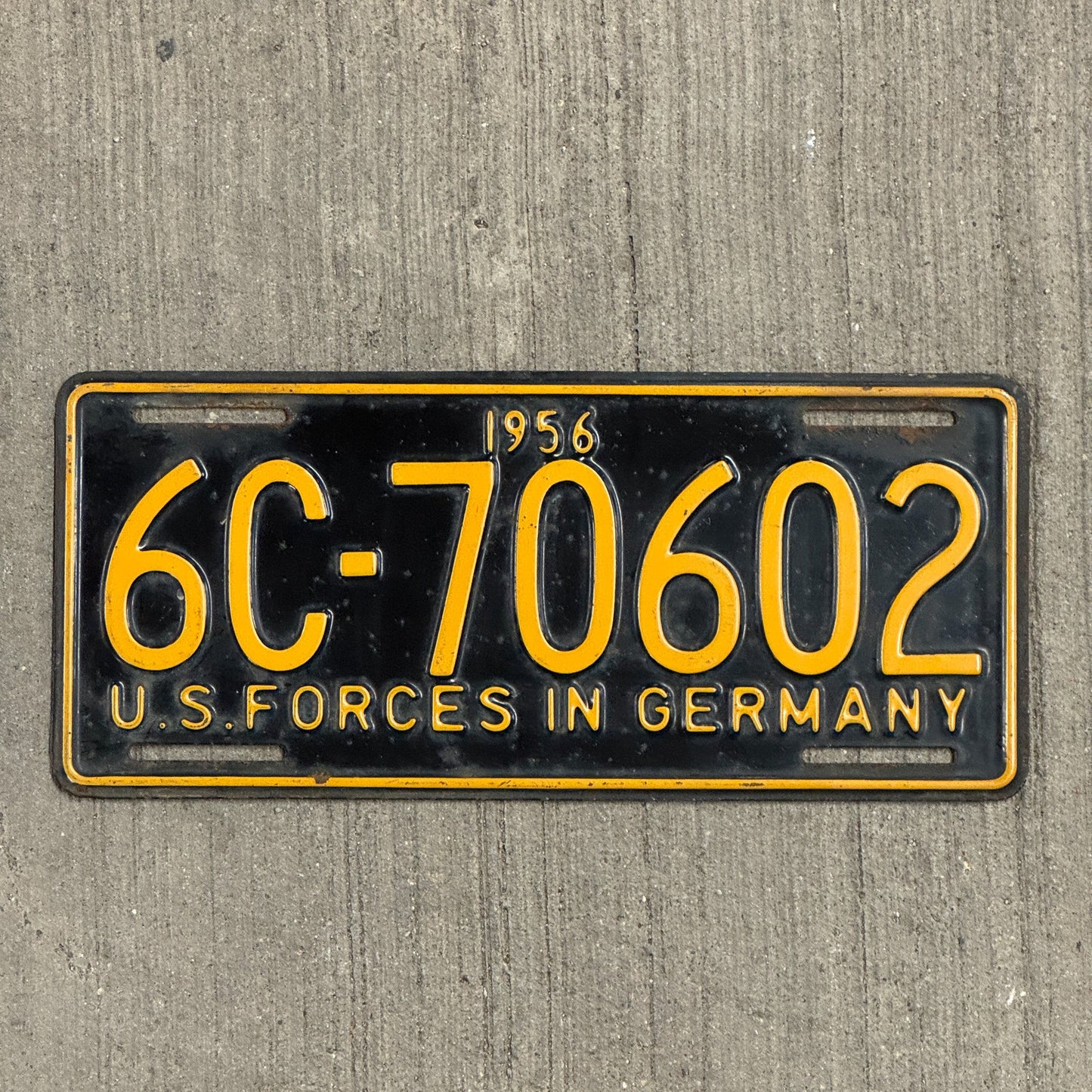 Photo of a 1956 US Forces Germany License Plate Auto Tag Garage Decor Vintage 6C 70602 with original patina