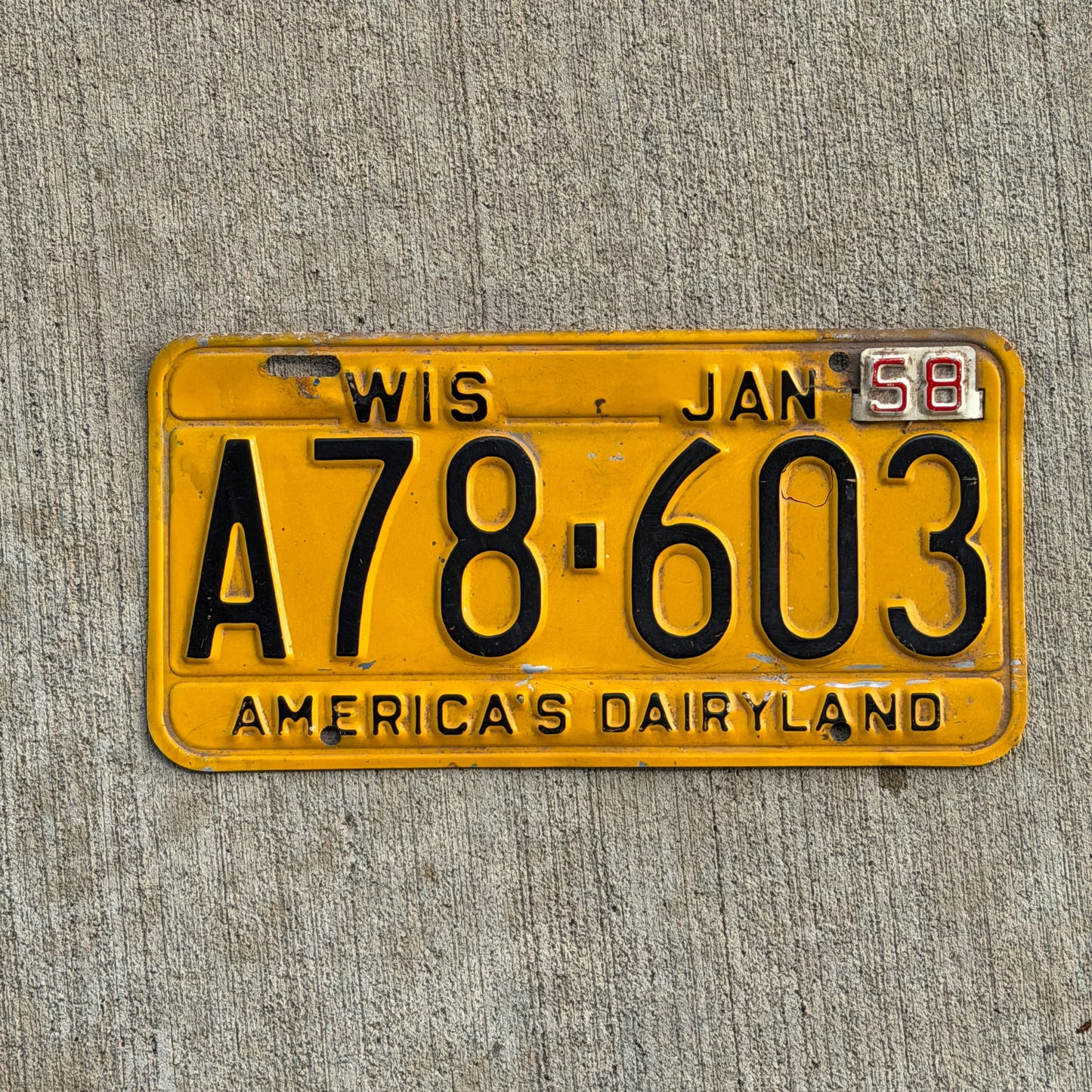 Photo of a 1957 1958 Wisconsin License Plate Auto Tag Garage Decor Vintage A 78 603 with original patina