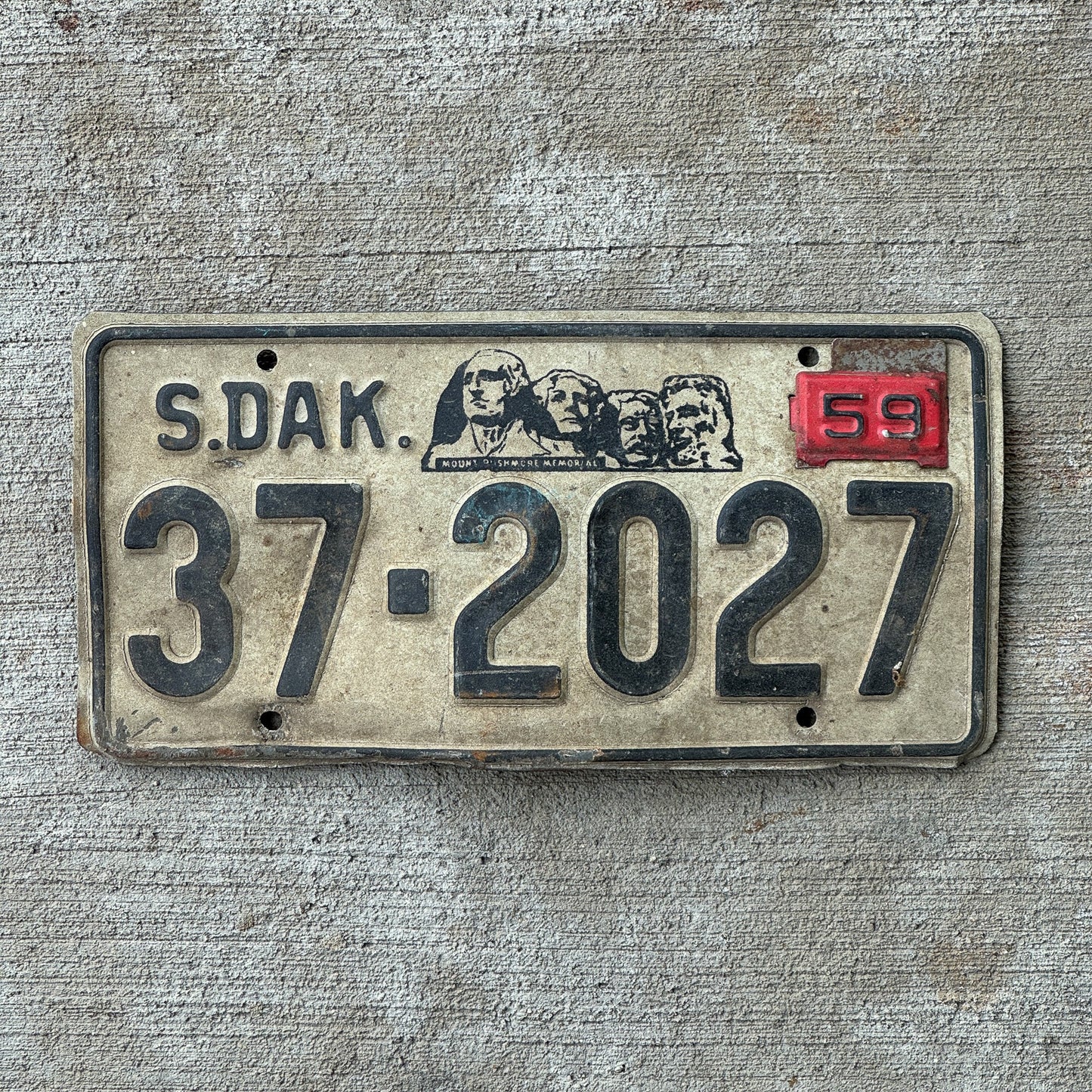 Photo of a 1957 1959 South Dakota License Plate Auto Tag Garage Decor Vintage Hutchinson 37 2027