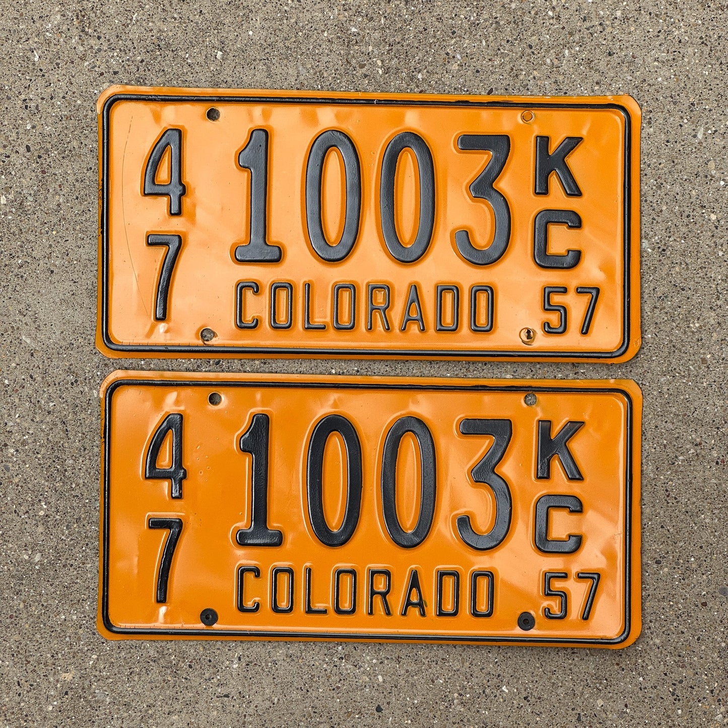 Photo of a 1957 Colorado City Truck License Plate Auto Tag Garage Decor Vintage 47 1003 KC