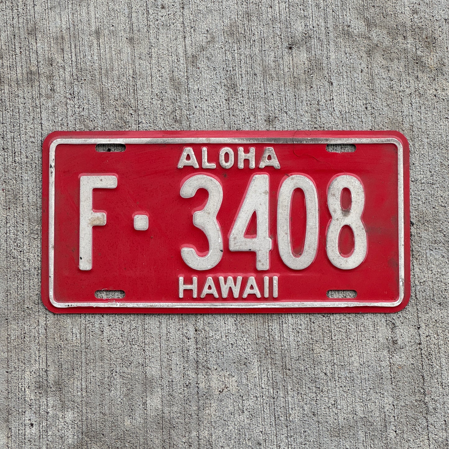 Photo of a 1957 Hawaii License Plate Auto Tag Garage Decor Vintage Aloha Tiki Bar Decor Honolulu County F 3408 with original patina