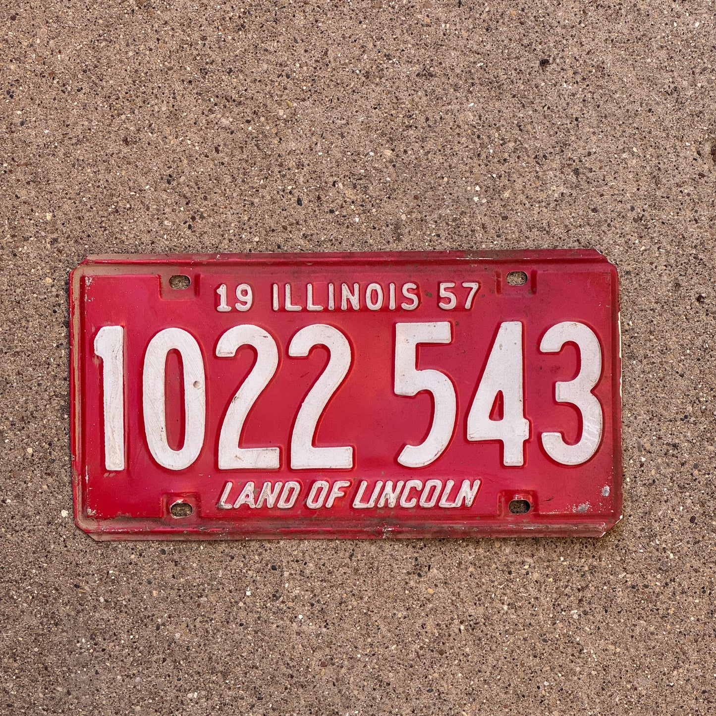 Photo of a 1957 Illinois License Plate Auto Tag 1 Vintage Garage 1 022 543 with original patina