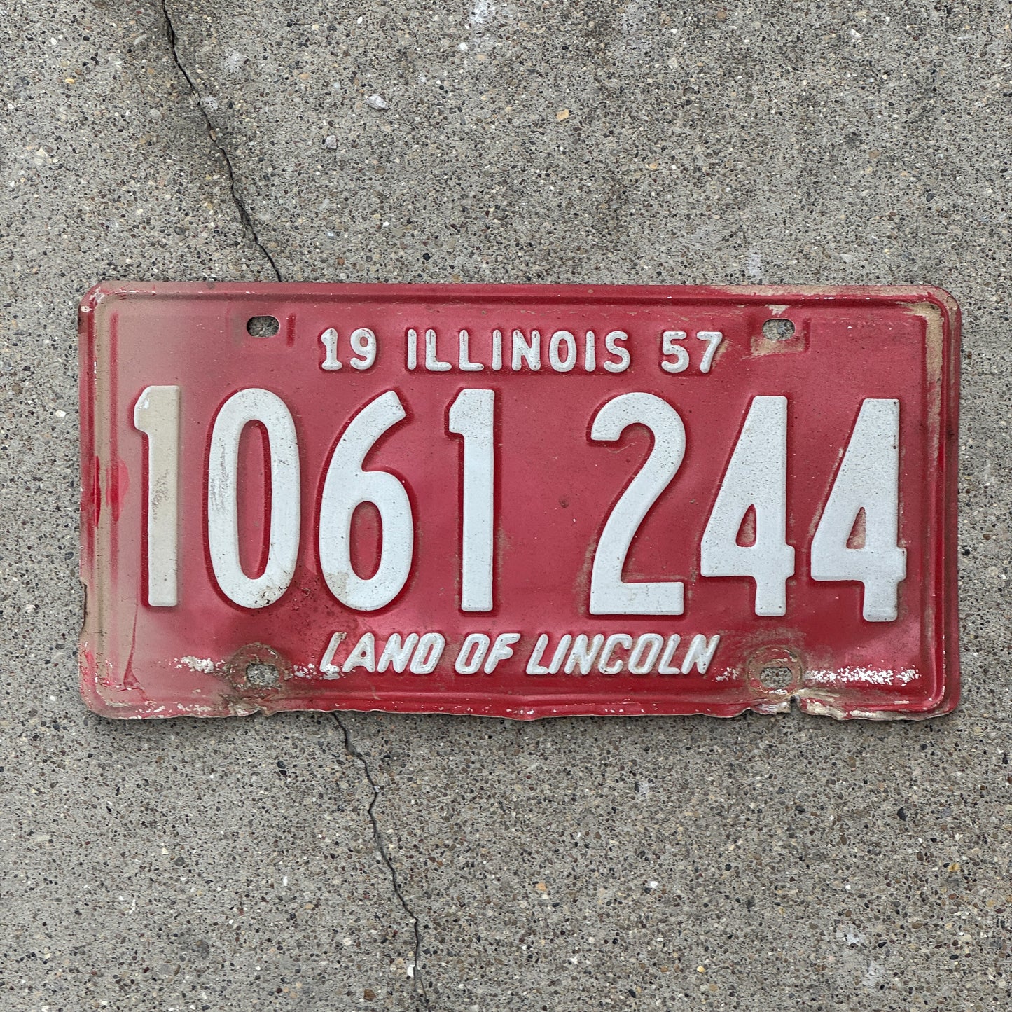 Photo of a 1957 Illinois License Plate Auto Tag 1 Vintage Garage 1 061 244 with original patina