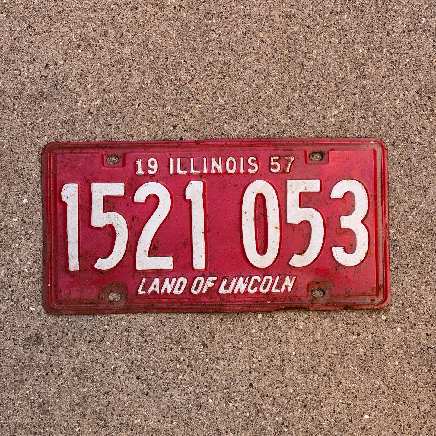 Photo of a 1957 Illinois License Plate Auto Tag 1 Vintage Garage 1 521 053 with original patina