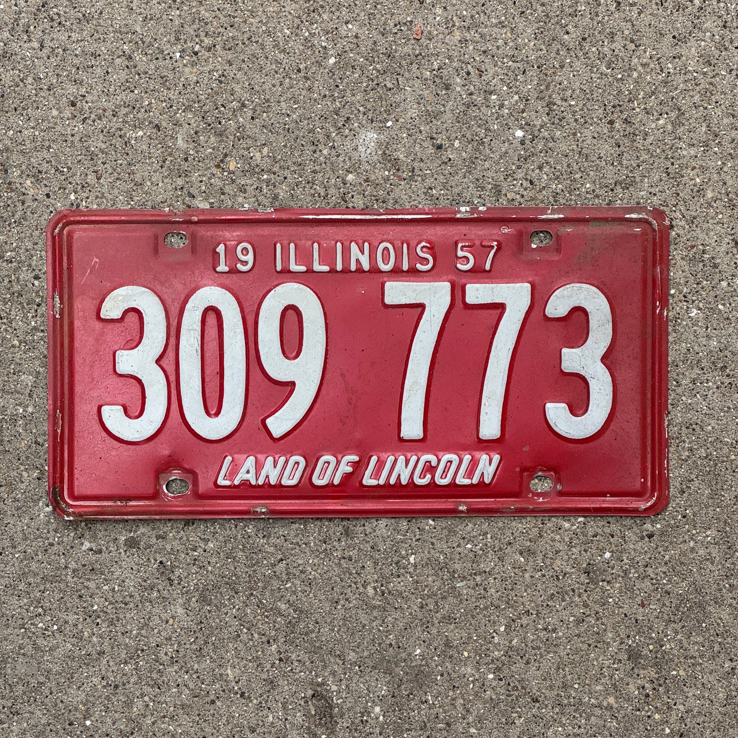 Photo of a 1957 Illinois License Plate Auto Tag 1 Vintage Garage 309 773 with original patina