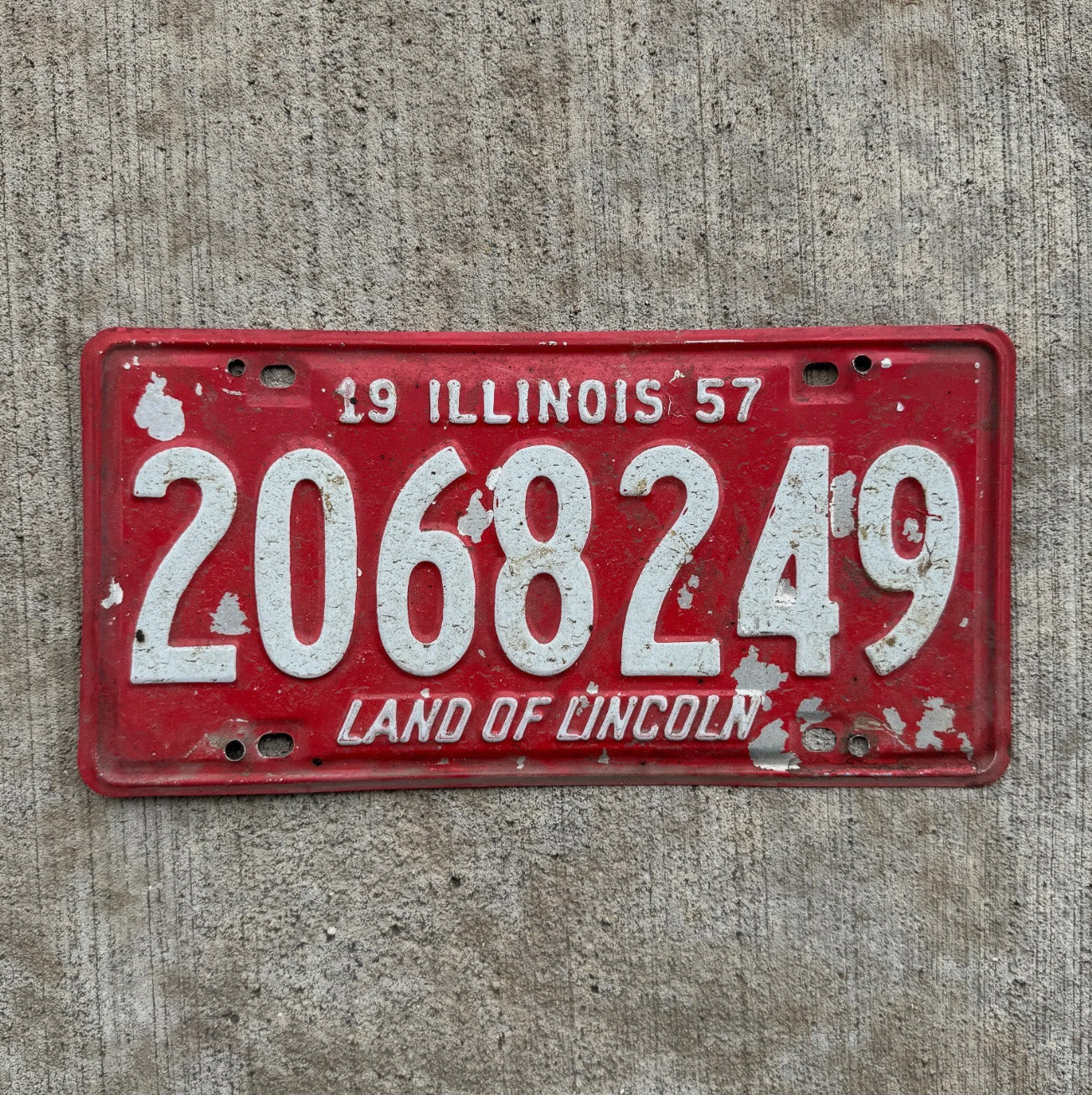Photo of a 1957 Illinois License Plate Auto Tag 2 Garage Decor Red White 2068249