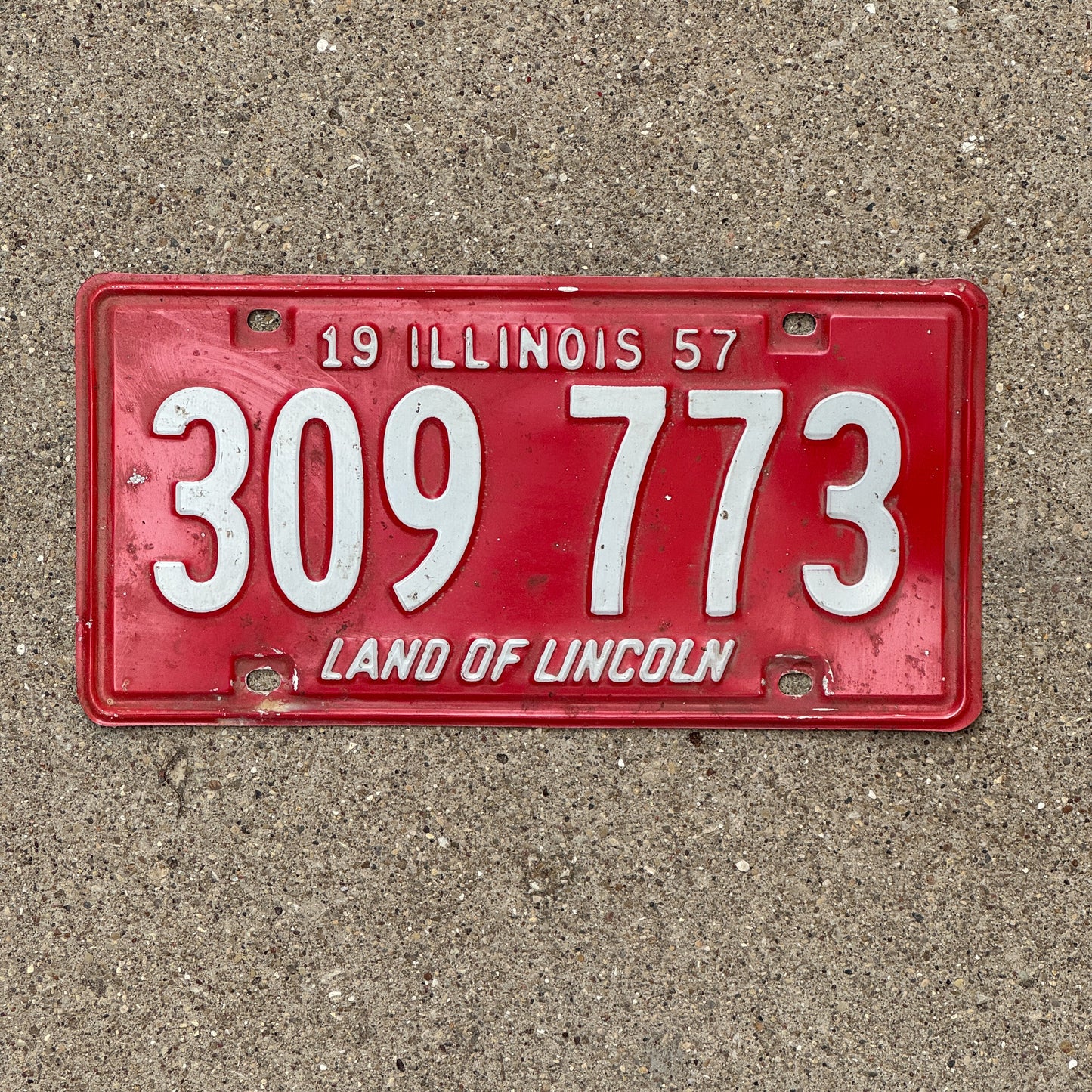 Photo of a 1957 Illinois License Plate Auto Tag 2 Vintage Garage 309 773 with original patina
