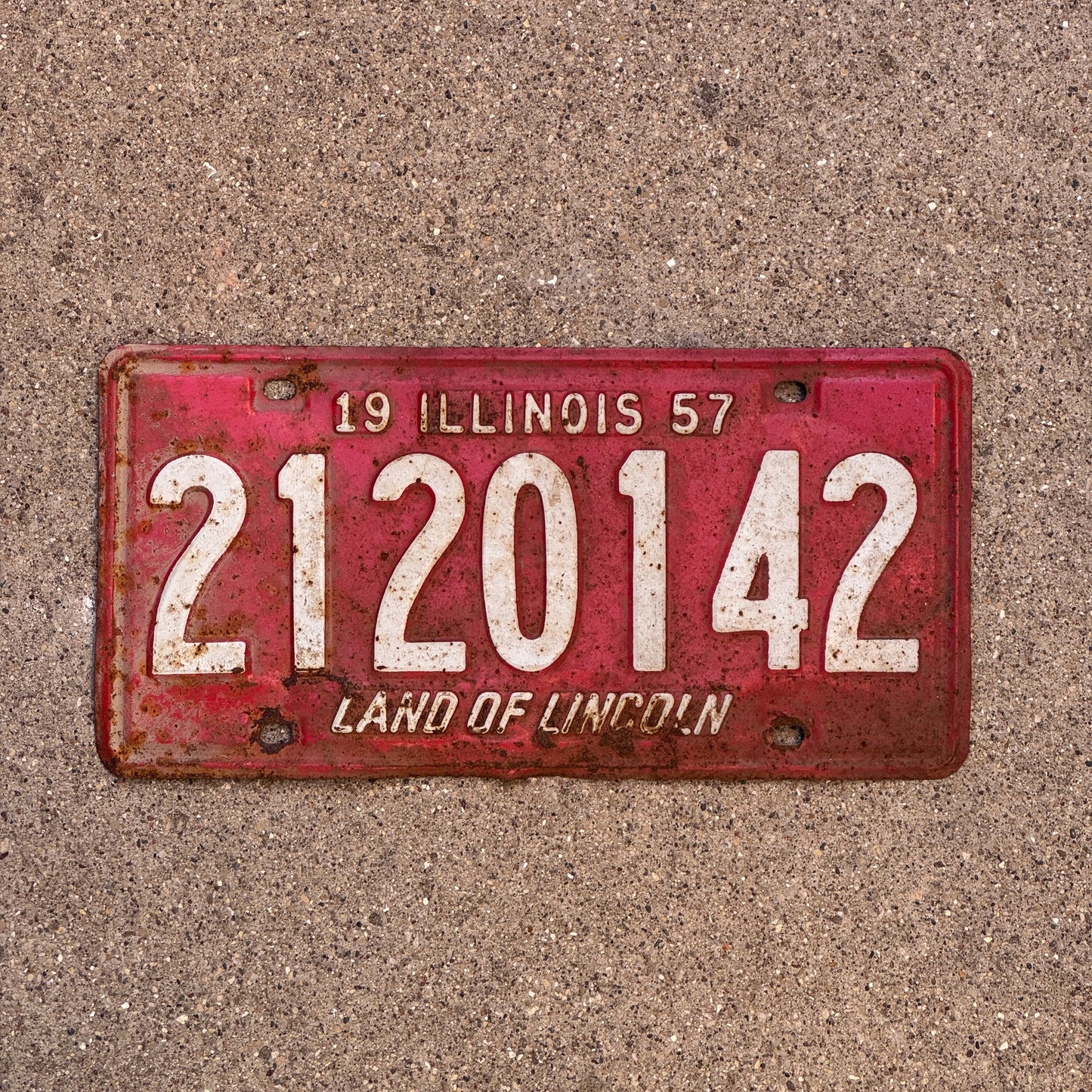 Photo of a 1957 Illinois License Plate Auto Tag Garage Decor Vintage 2 120 142 with original patina