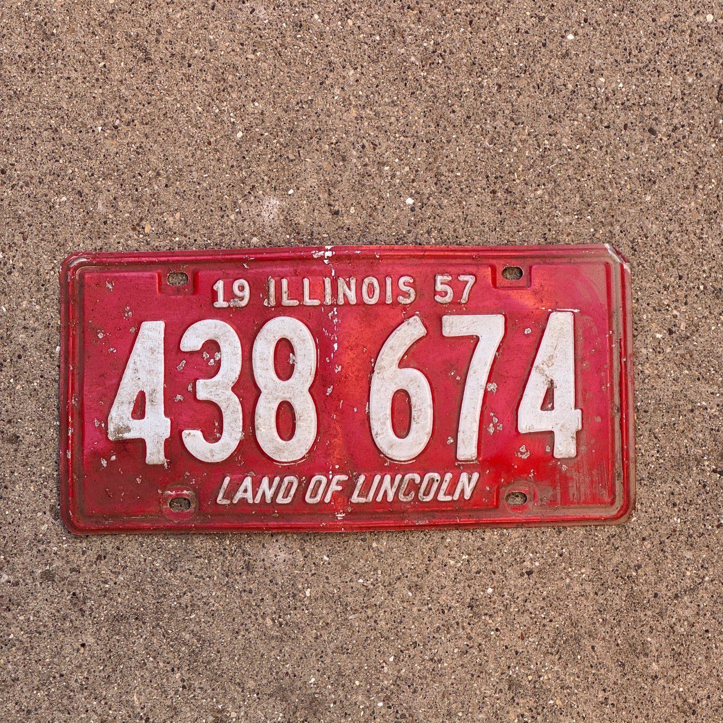 Photo of a 1957 Illinois License Plate Auto Tag Garage Decor Vintage 438 674 with original patina