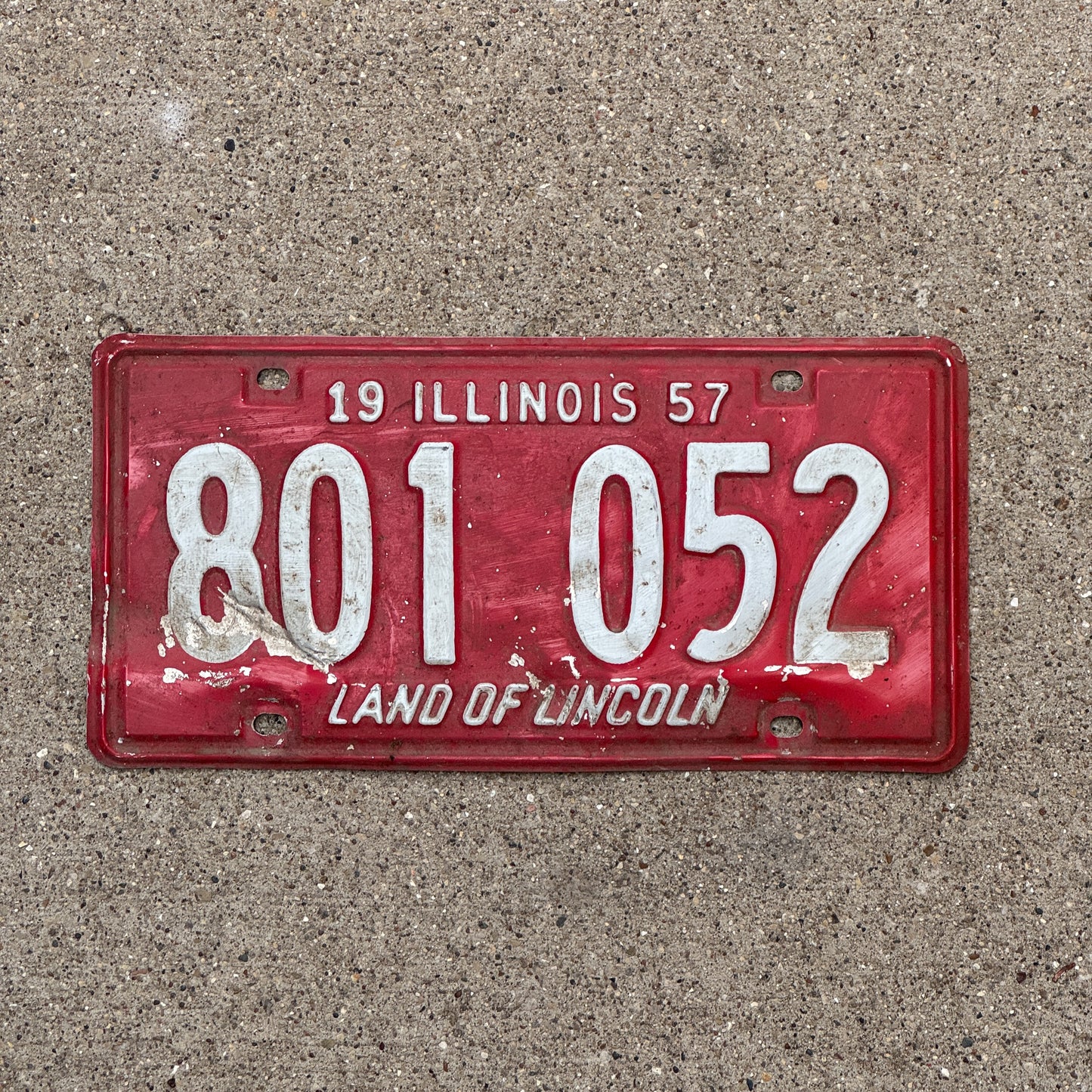 Photo of a 1957 Illinois License Plate Auto Tag Garage Decor Vintage 801 052 with original patina