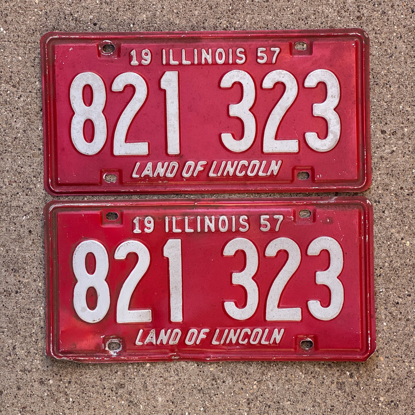 Photo of a 1957 Illinois License Plate Pair Auto Tag Garage Decor Vintage 821 323 with original patina