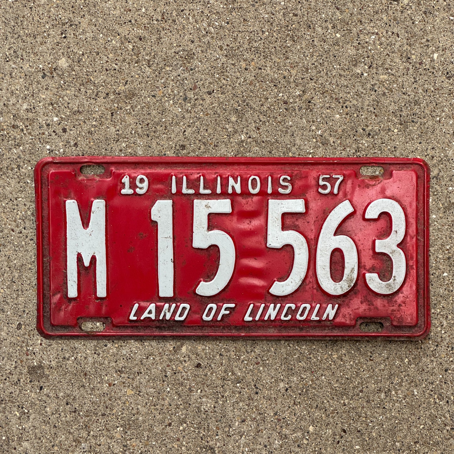 Photo of a 1957 Illinois Municipal License Plate Auto Tag 2 Vintage Garage M 15 563 with original patina