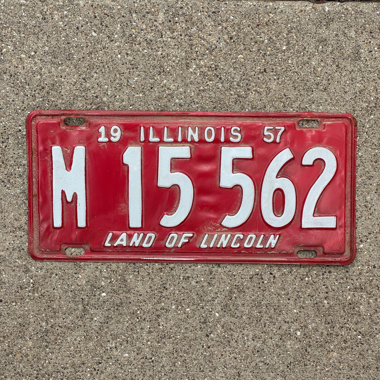 Photo of a 1957 Illinois Municipal License Plate Auto Tag Garage Decor Vintage M 15 562 with original patina