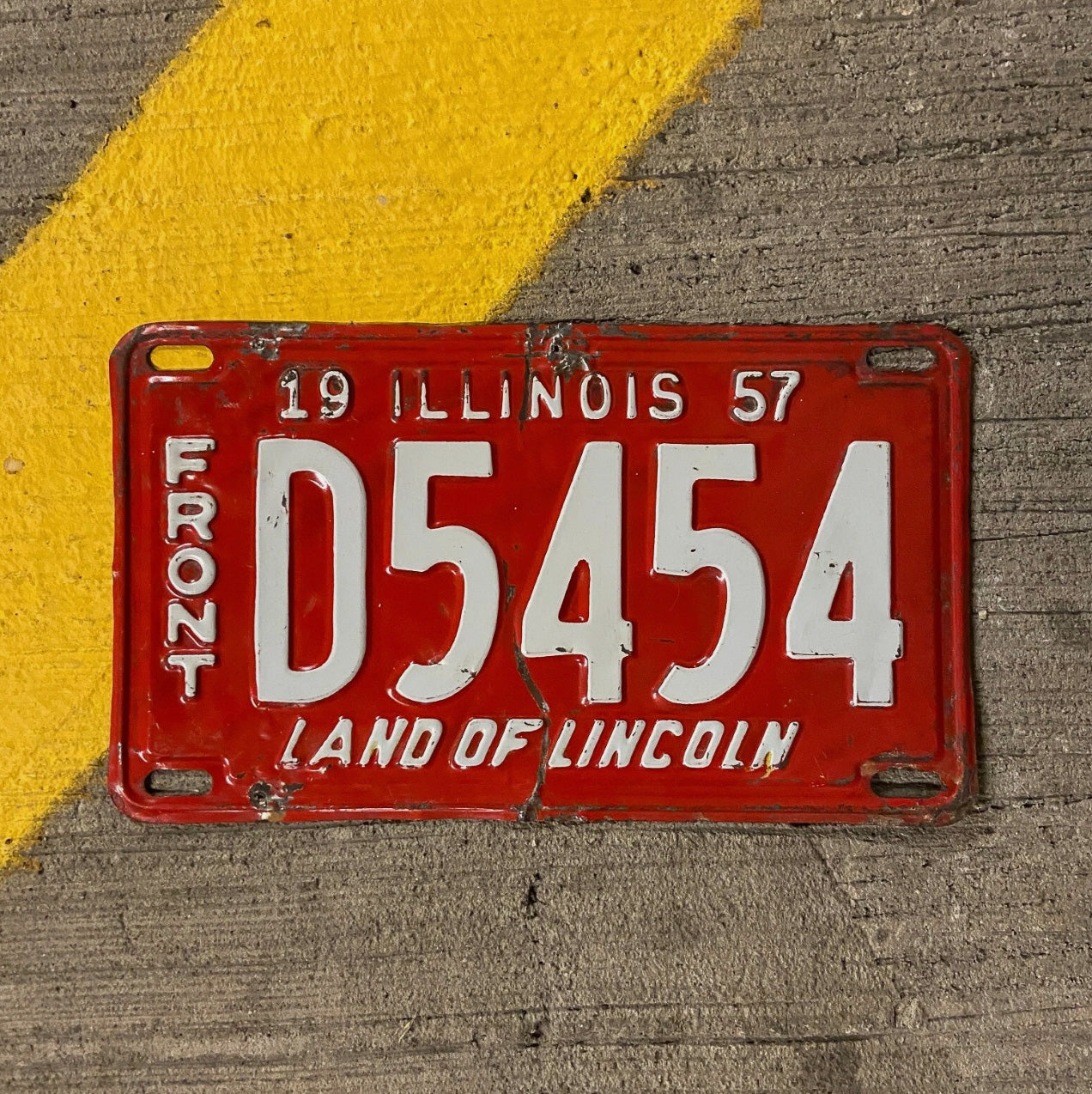 Photo of a 1957 Illinois Truck License Plate Auto Tag Garage Decor Vintage Repeat Repeating D 5454 with original patina