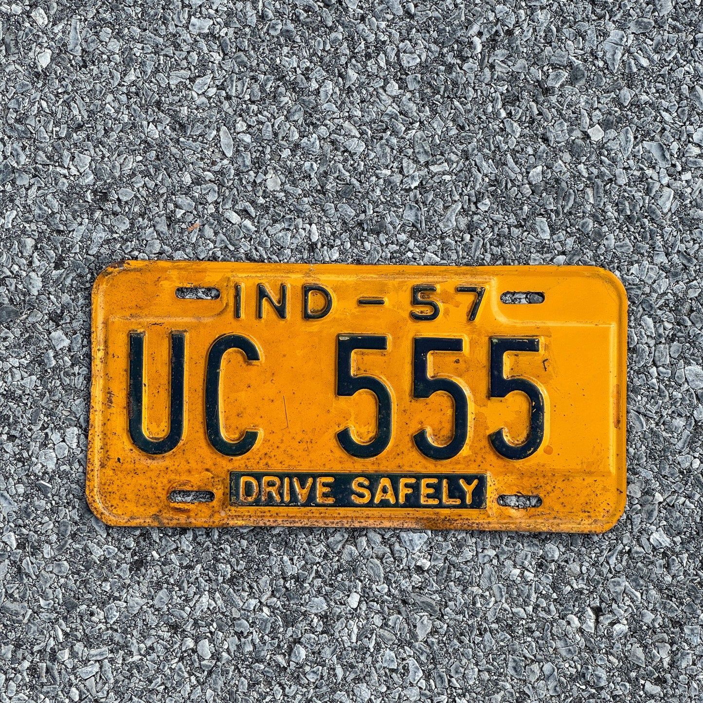 Photo of a 1957 Indiana License Plate Auto Tag Garage Decor Vintage Repeat Repeating UC 555