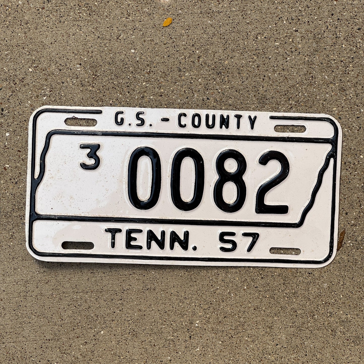 Photo of a 1957 Tennessee County License Plate Auto Tag Garage Decor Vintage 3 0082