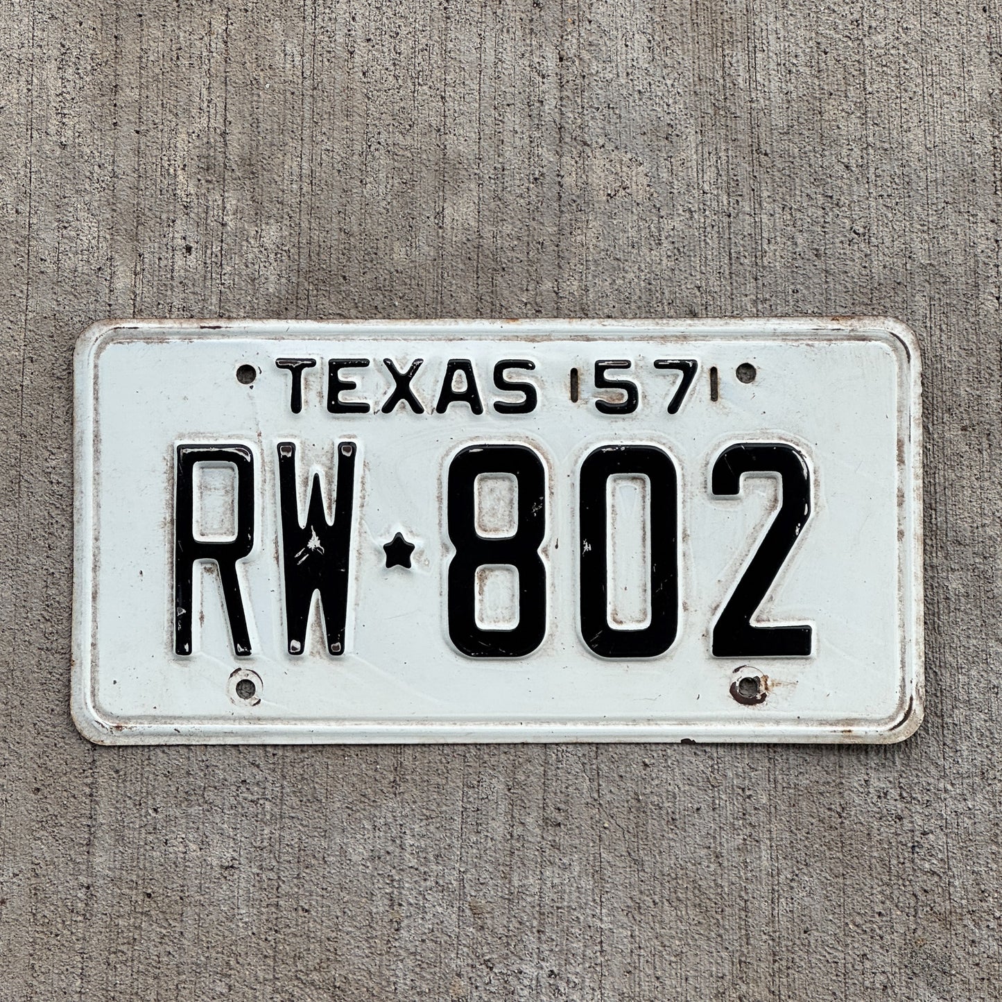 Photo of a 1957 Texas License Plate Auto Tag Garage Decor Vintage RW 802 with original patina