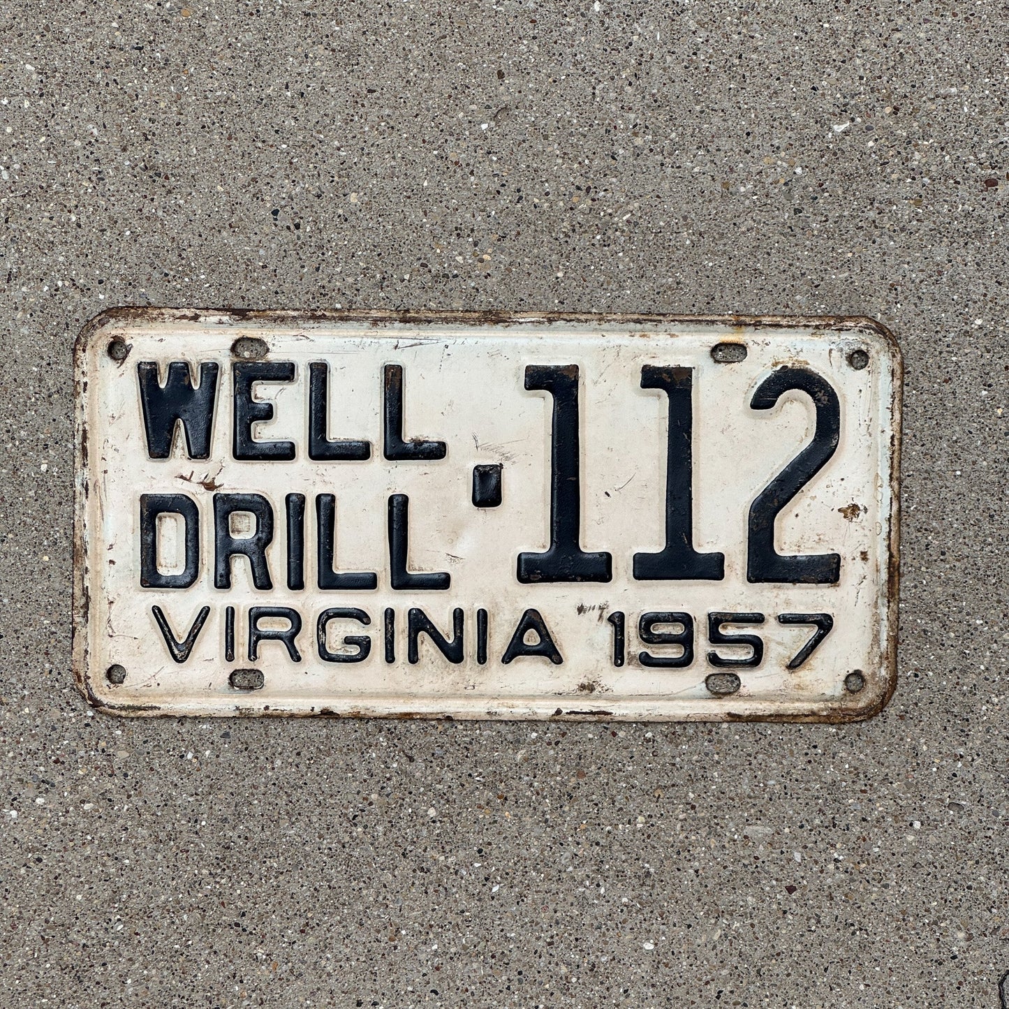 Photo of a 1957 Virginia Well Drill License Plate Auto Tag Garage Decor Vintage 112