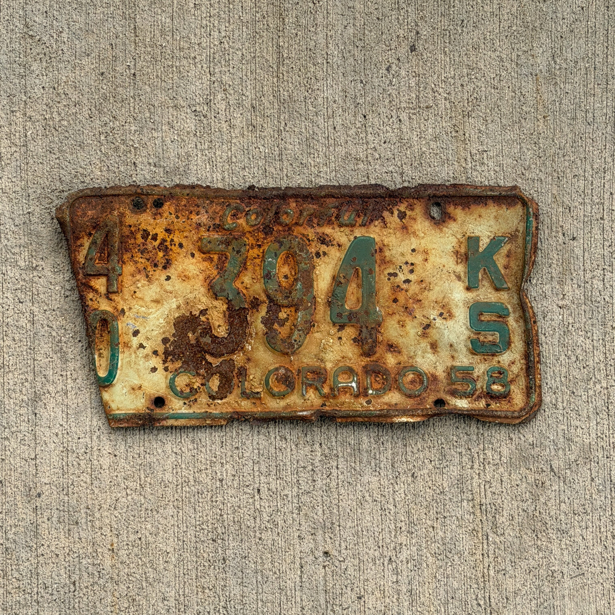Photo of a 1958 Colorado Truck License Plate Auto Tag Garage Decor Vintage 40 394 KS with original patina