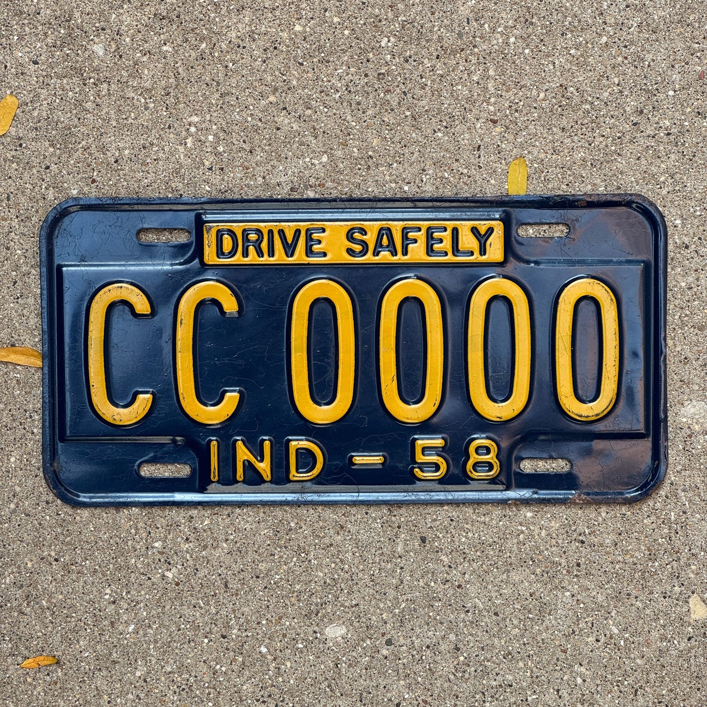 Photo of a 1958 Indiana Sample License Plate Auto Tag Garage Decor Vintage CC 0000 with original patina