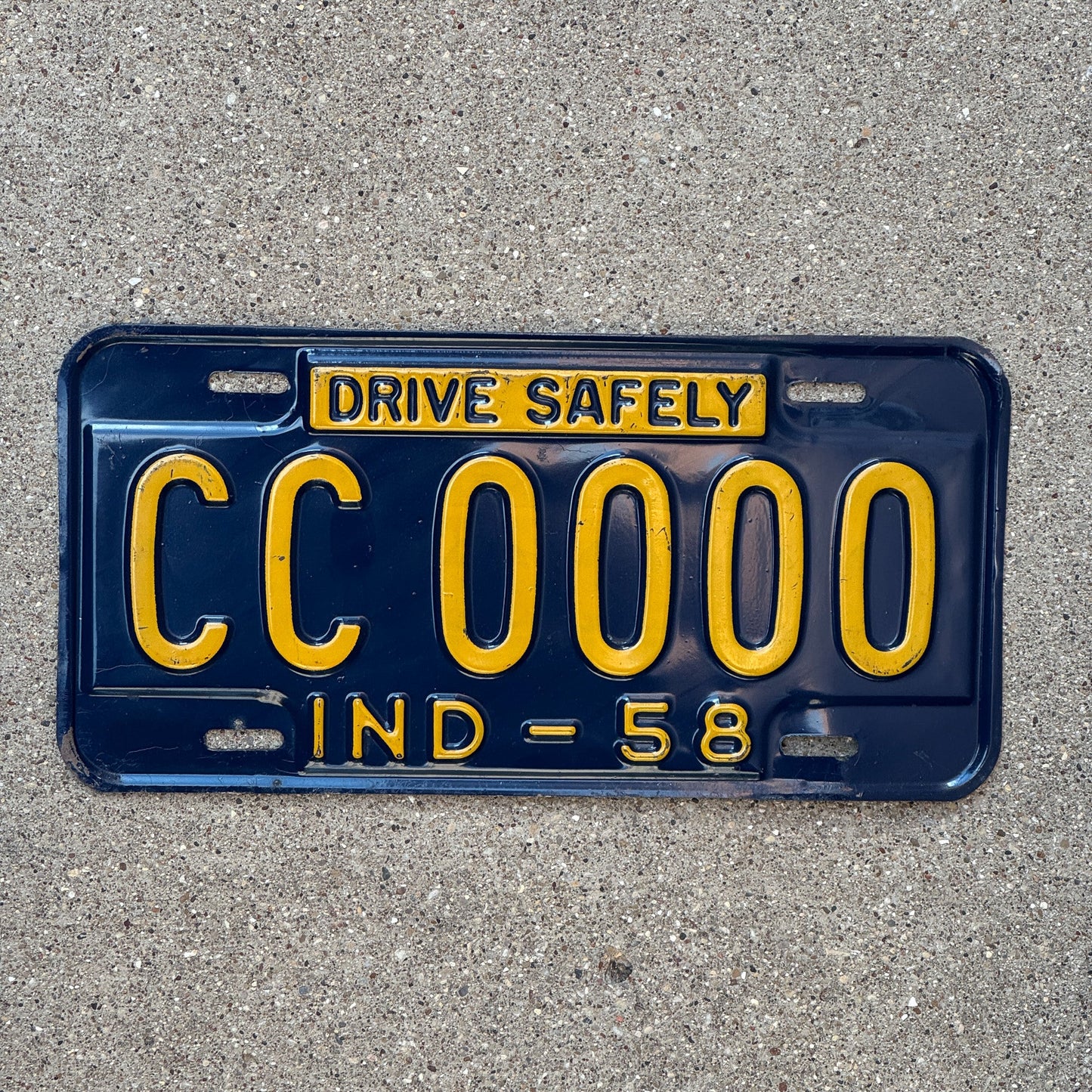 Photo of a 1958 Indiana Sample License Plate Auto Tag Garage Decor Vintage CC0000 with original patina