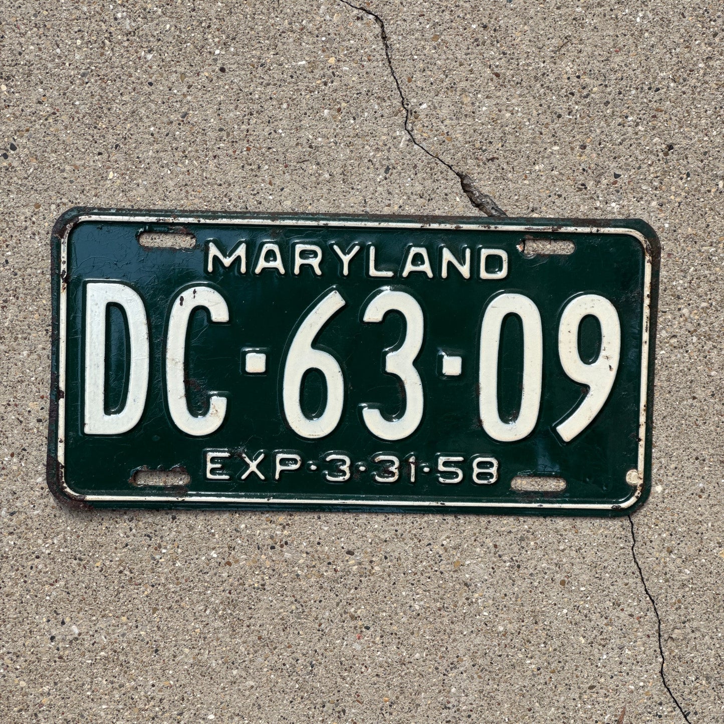 Photo of a 1958 Maryland License Plate Auto Tag 1 Garage Decor DC 6309