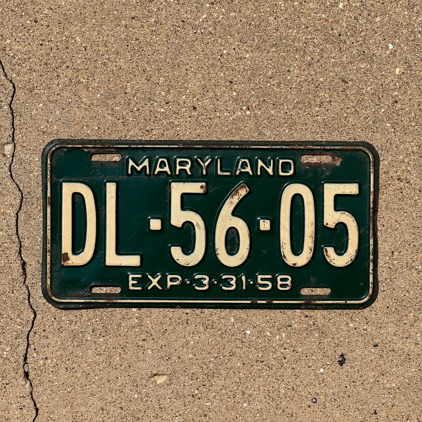 Photo of a 1958 Maryland License Plate Auto Tag Garage Decor Vintage DL 5605