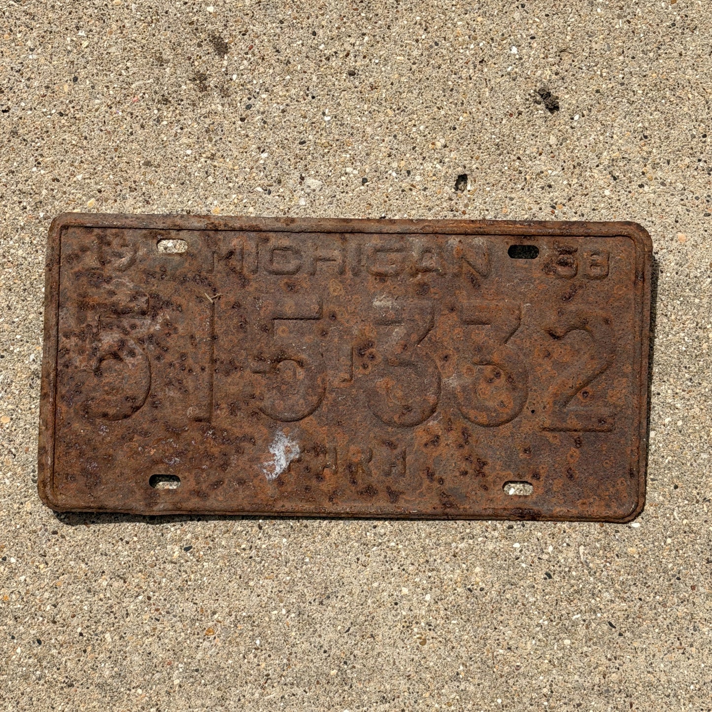 Photo of a 1958 Michigan Farm License Plate Auto Tag Garage Decor Vintage 515 332 with original patina