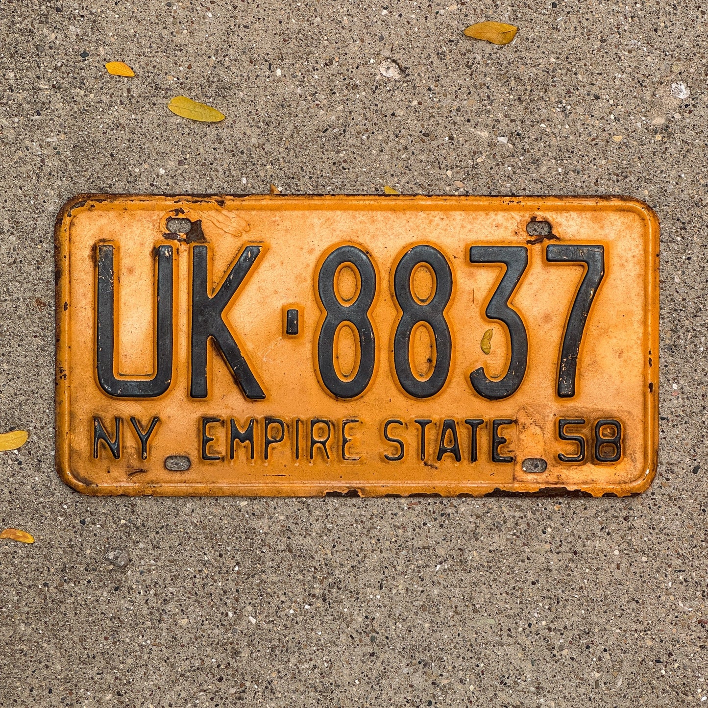 Photo of a 1958 New York License Plate Auto Tag Garage Decor Vintage United Kingdom Gift UK 8837 with original patina
