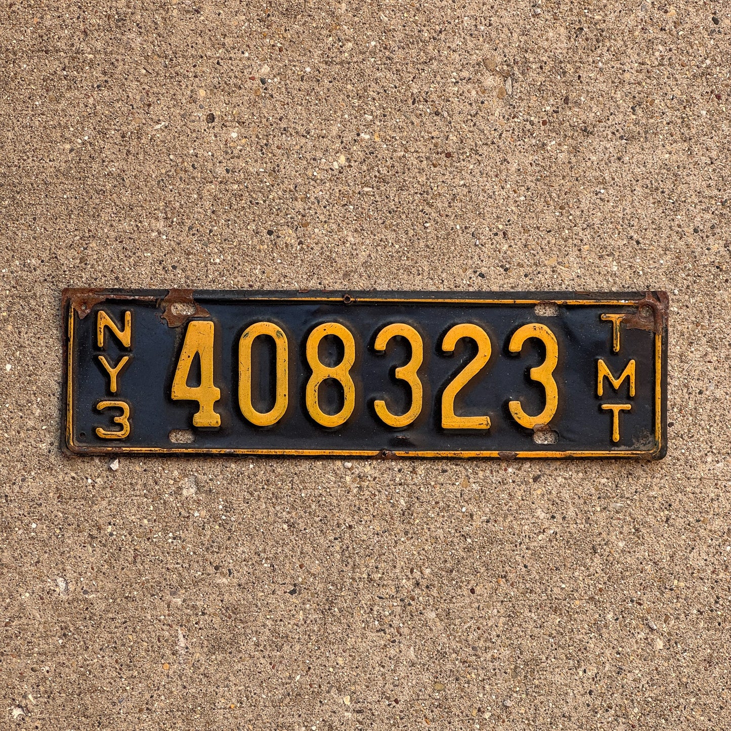 Photo of a 1958 New York Truck Mile Tax License Plate Auto Tag Garage Decor Vintage Series 3 408323 TMT