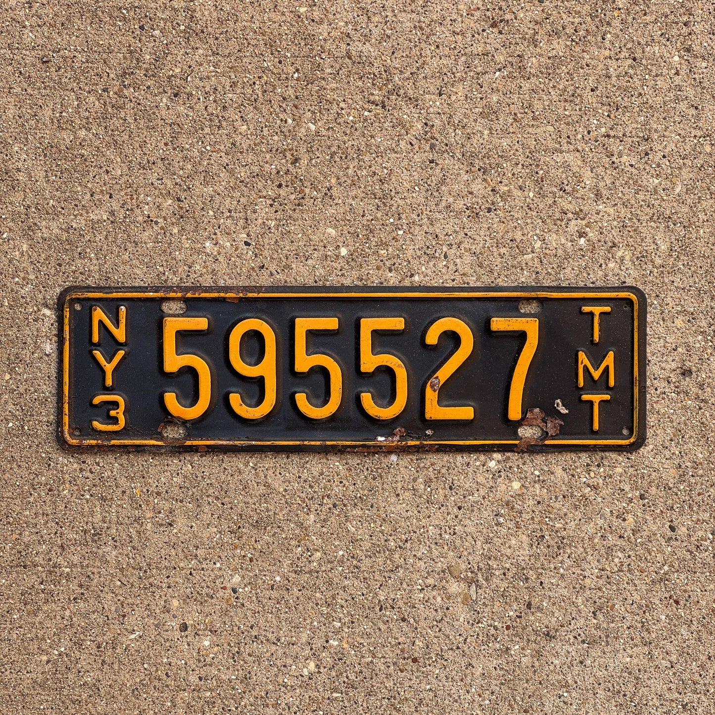 Photo of a 1958 New York Truck Mile Tax License Plate Auto Tag Garage Decor Vintage Series 3 595527 TMT