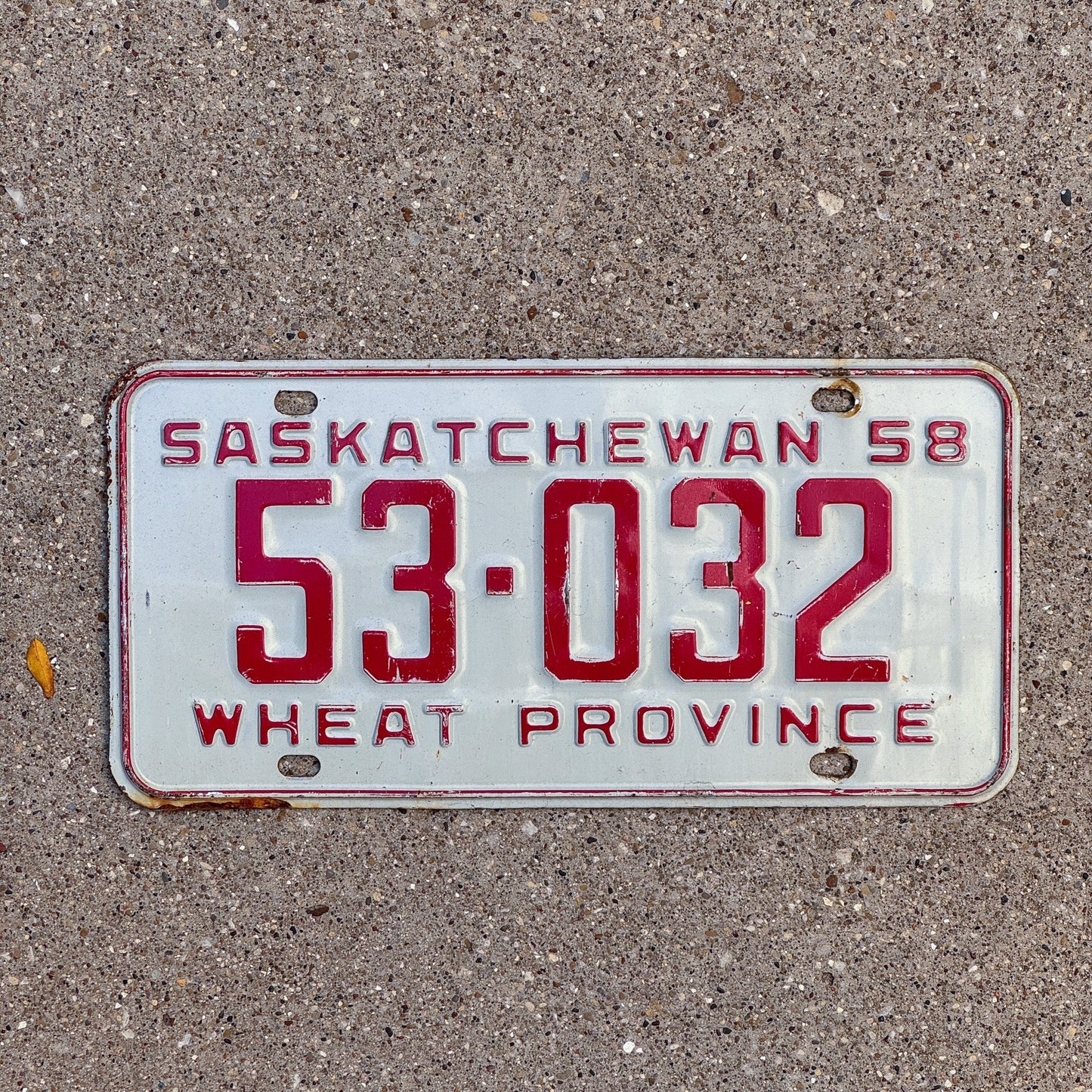 Photo of a 1958 Saskatchewan License Plate Auto Tag Garage Decor Vintage 53 032