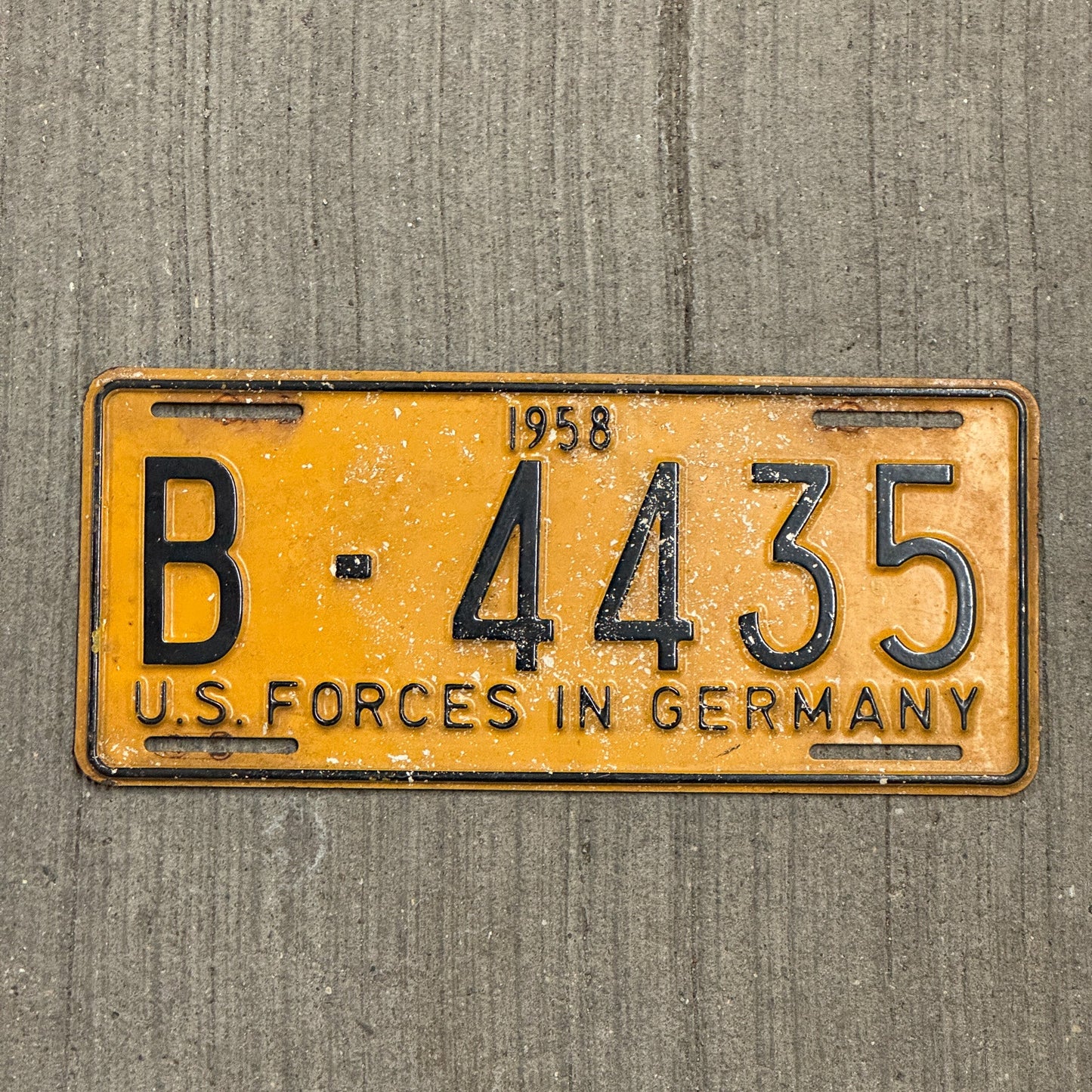 Photo of a 1958 US Forces Germany License Plate Auto Tag Garage Decor Vintage B 4435 with original patina