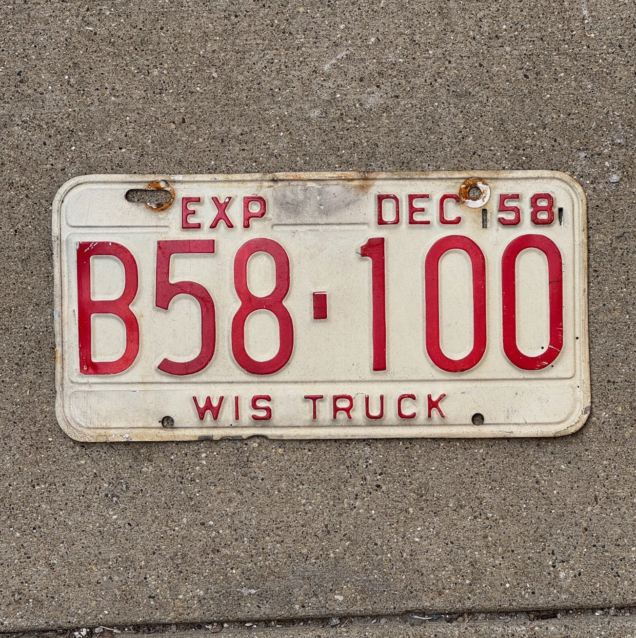 Photo of a 1958 Wisconsin Truck License Plate Auto Tag Garage Decor B 58100
