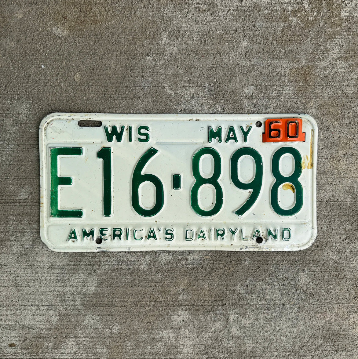 Photo of a 1959 1960 Wisconsin License Plate Auto Tag Garage Decor Vintage E 16 898 with original patina
