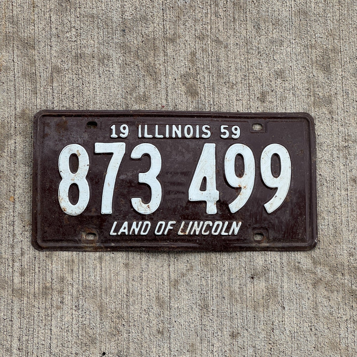 Photo of a 1959 Illinois License Plate Auto Tag 1 Vintage Garage 873 499 with original patina