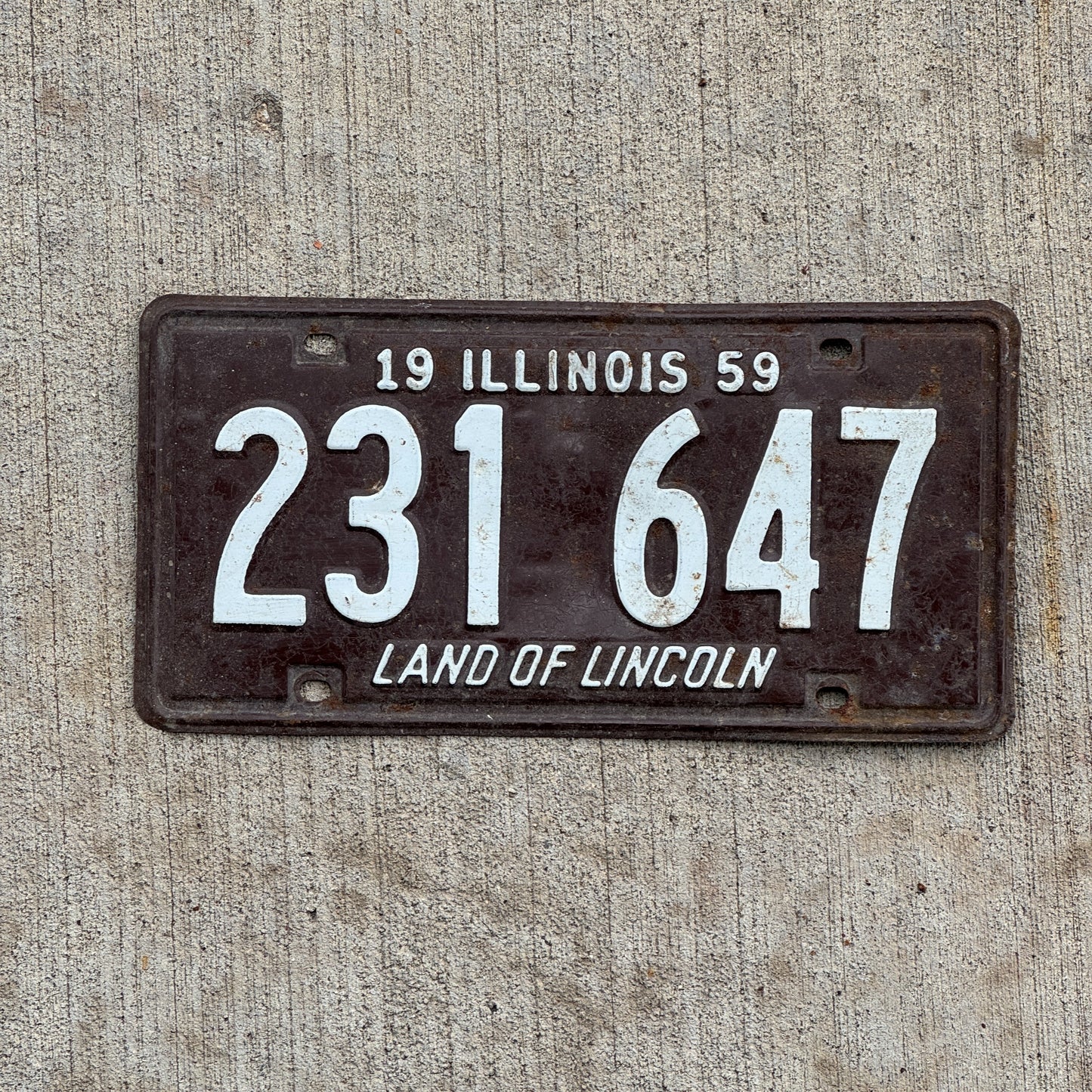 Photo of a 1959 Illinois License Plate Auto Tag 2 Vintage Garage 231 647 with original patina