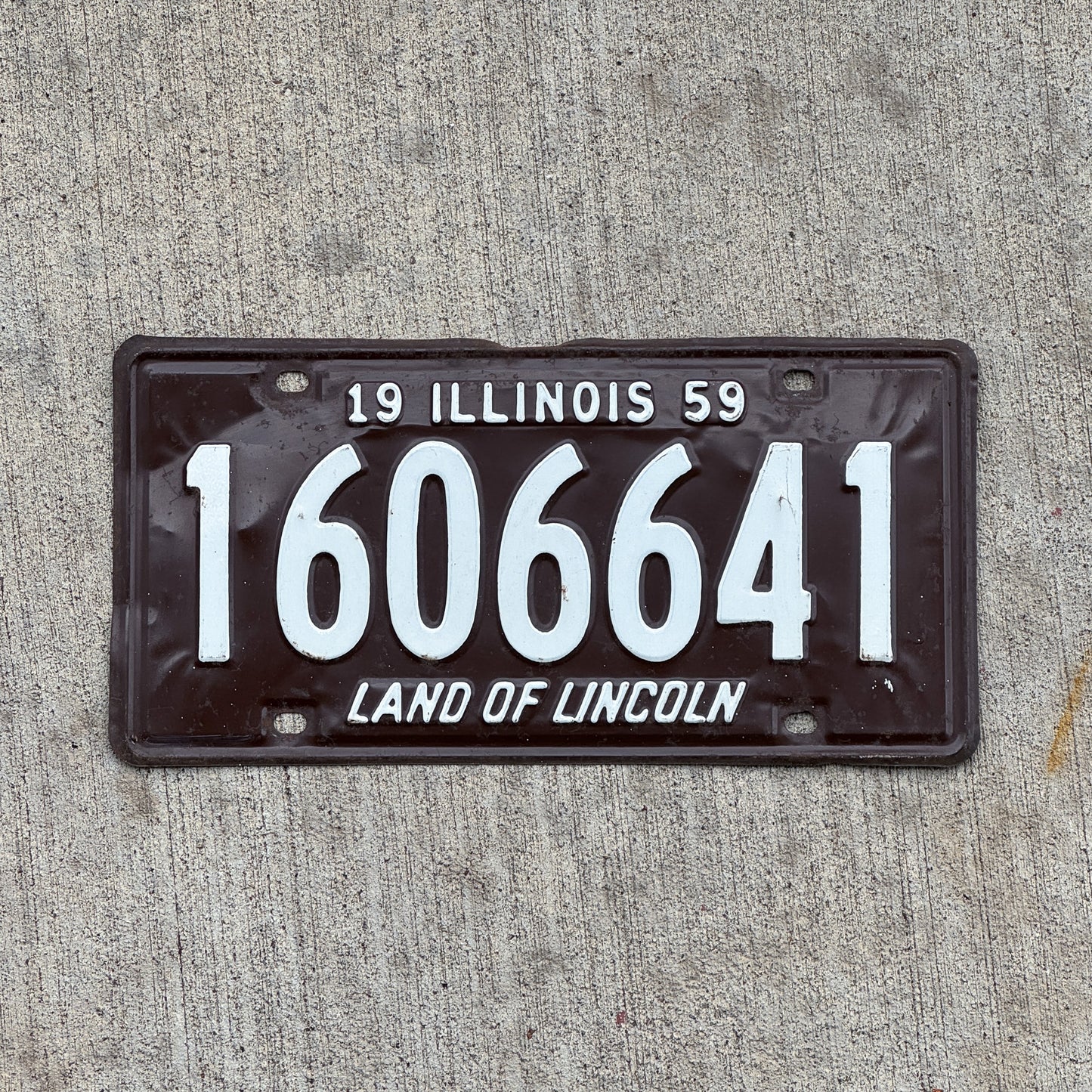 Photo of a 1959 Illinois License Plate Auto Tag Garage Decor Vintage 1 606 641 with original patina